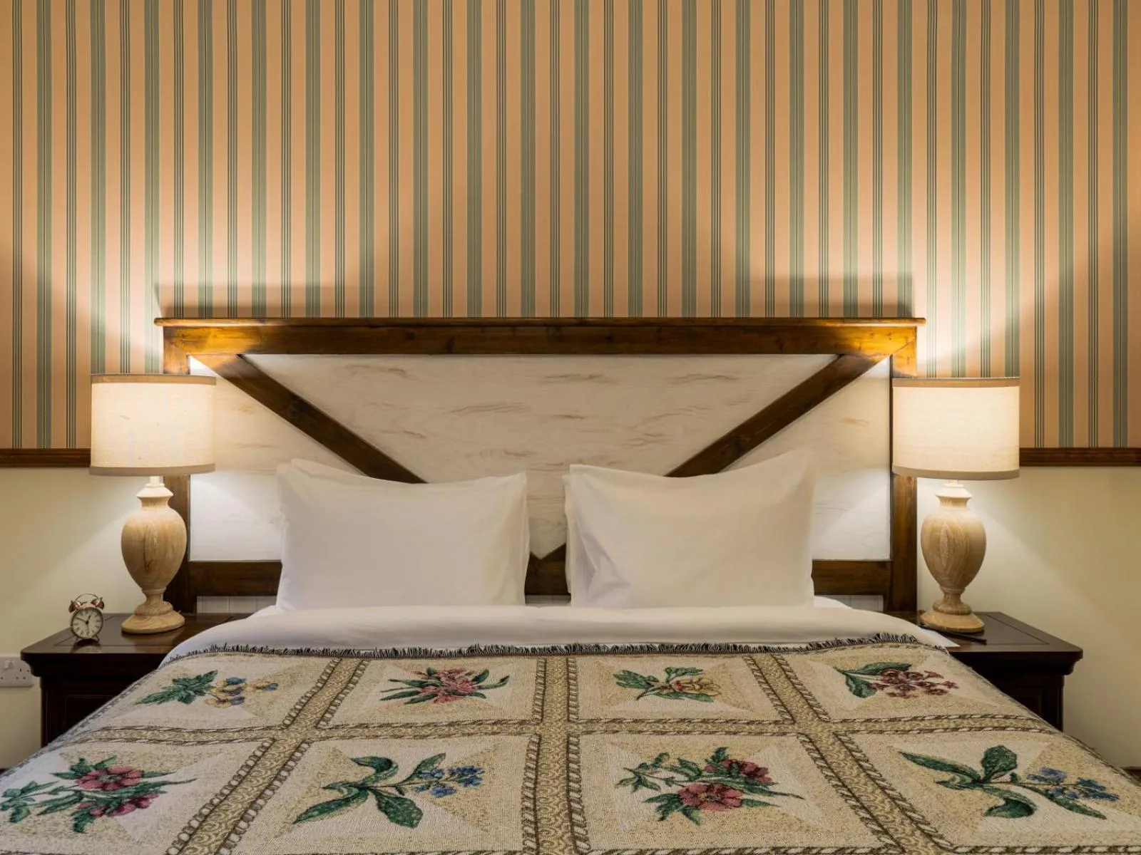 Bed in The Whispering Pine Lodge