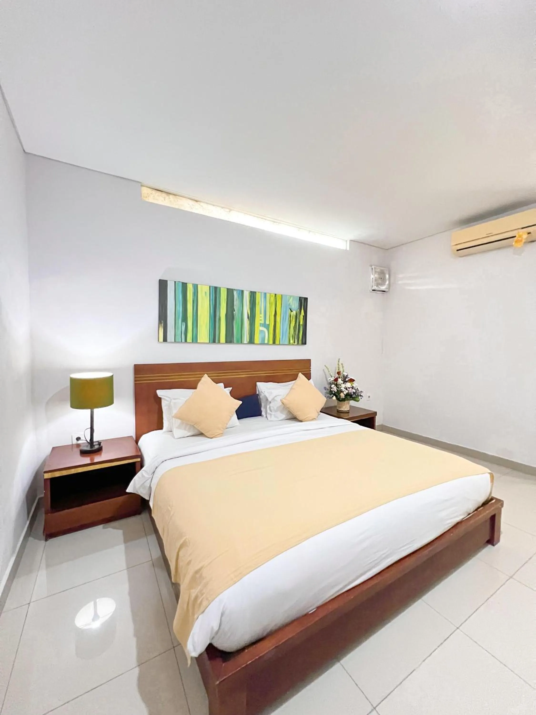 Bed in Apple Villas & Apartments