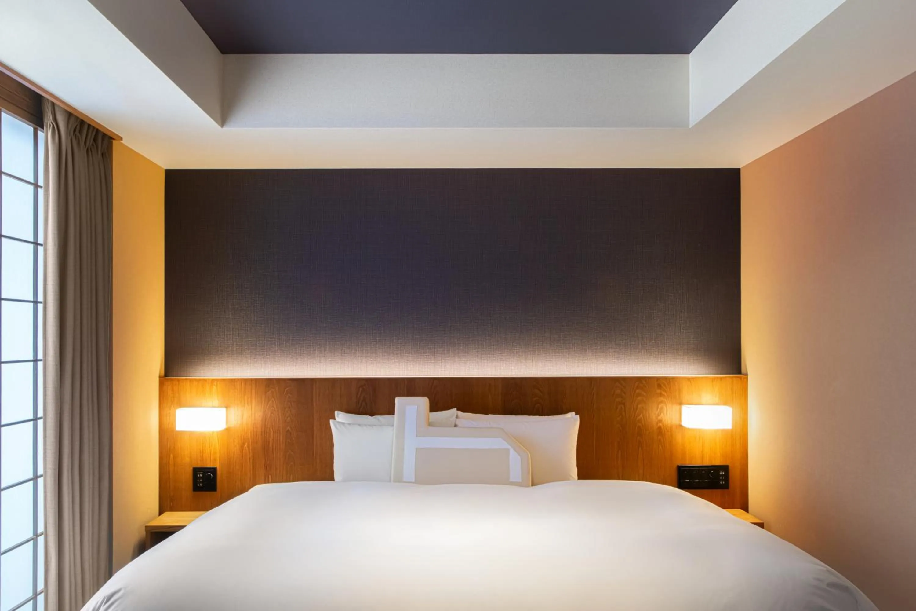 Bed in Homm Stay Nagi Arashiyama Kyoto By Banyan Group