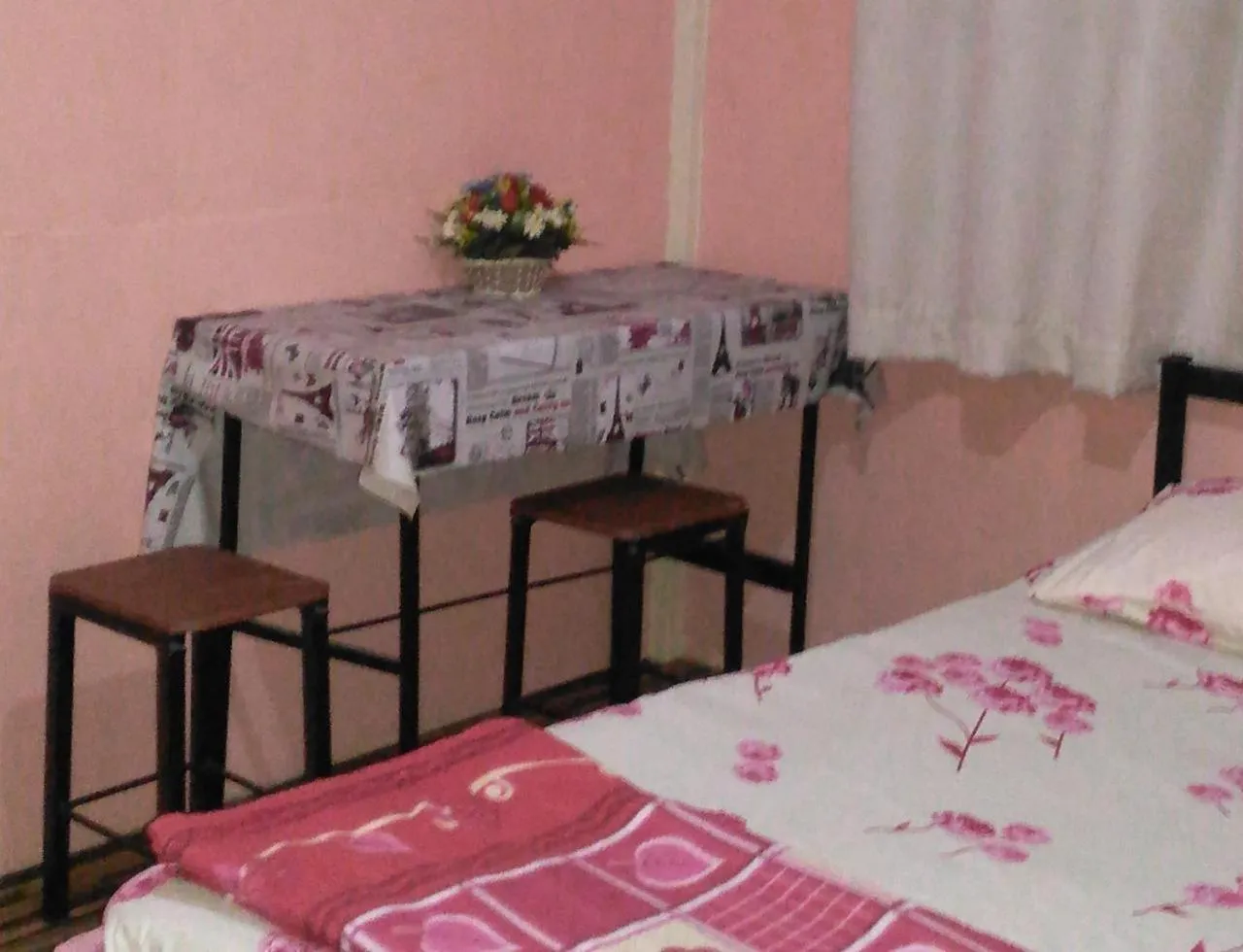 Photo of the whole room, Bed in The Kong