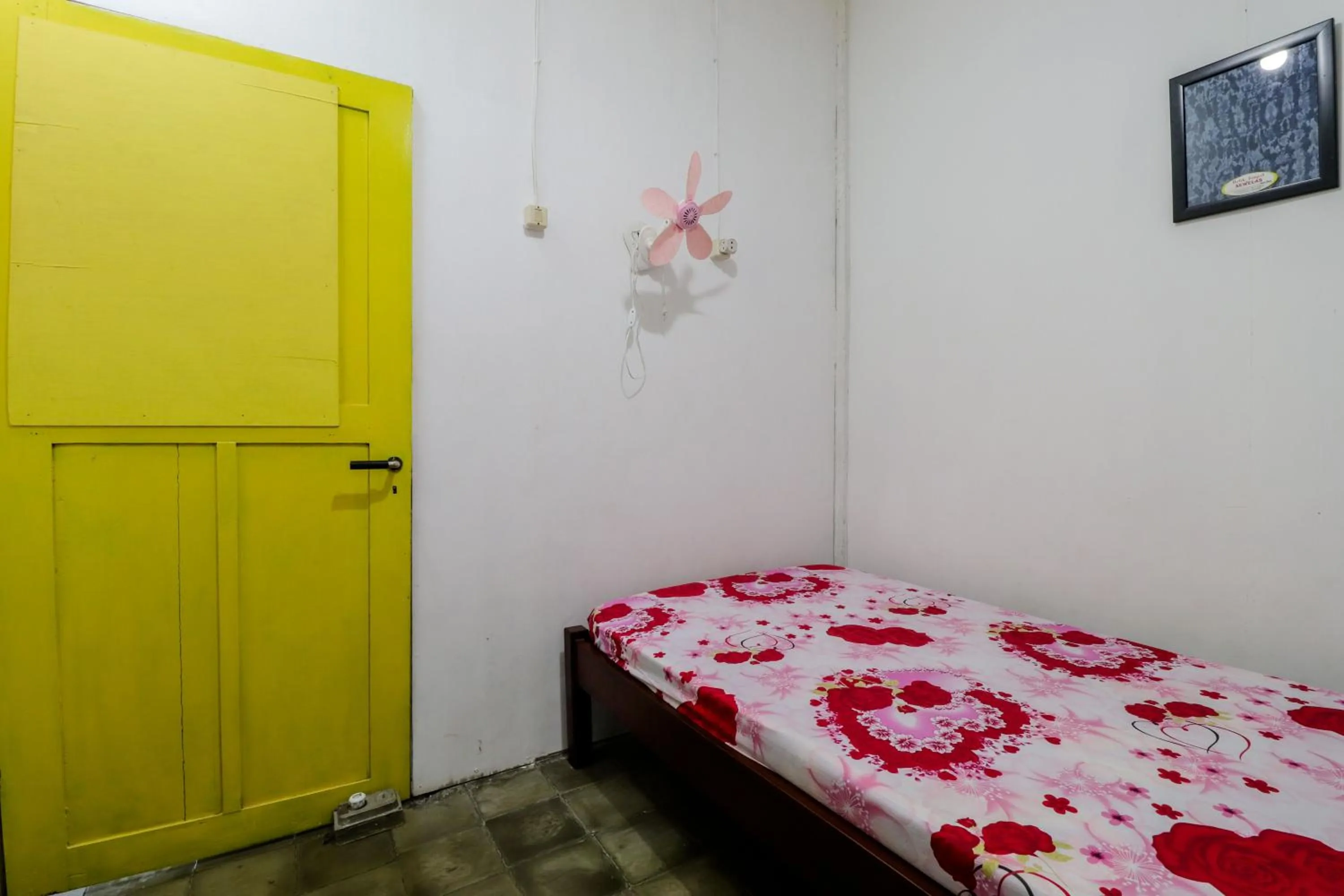 Bed in Homestay Ndalem Soewondo