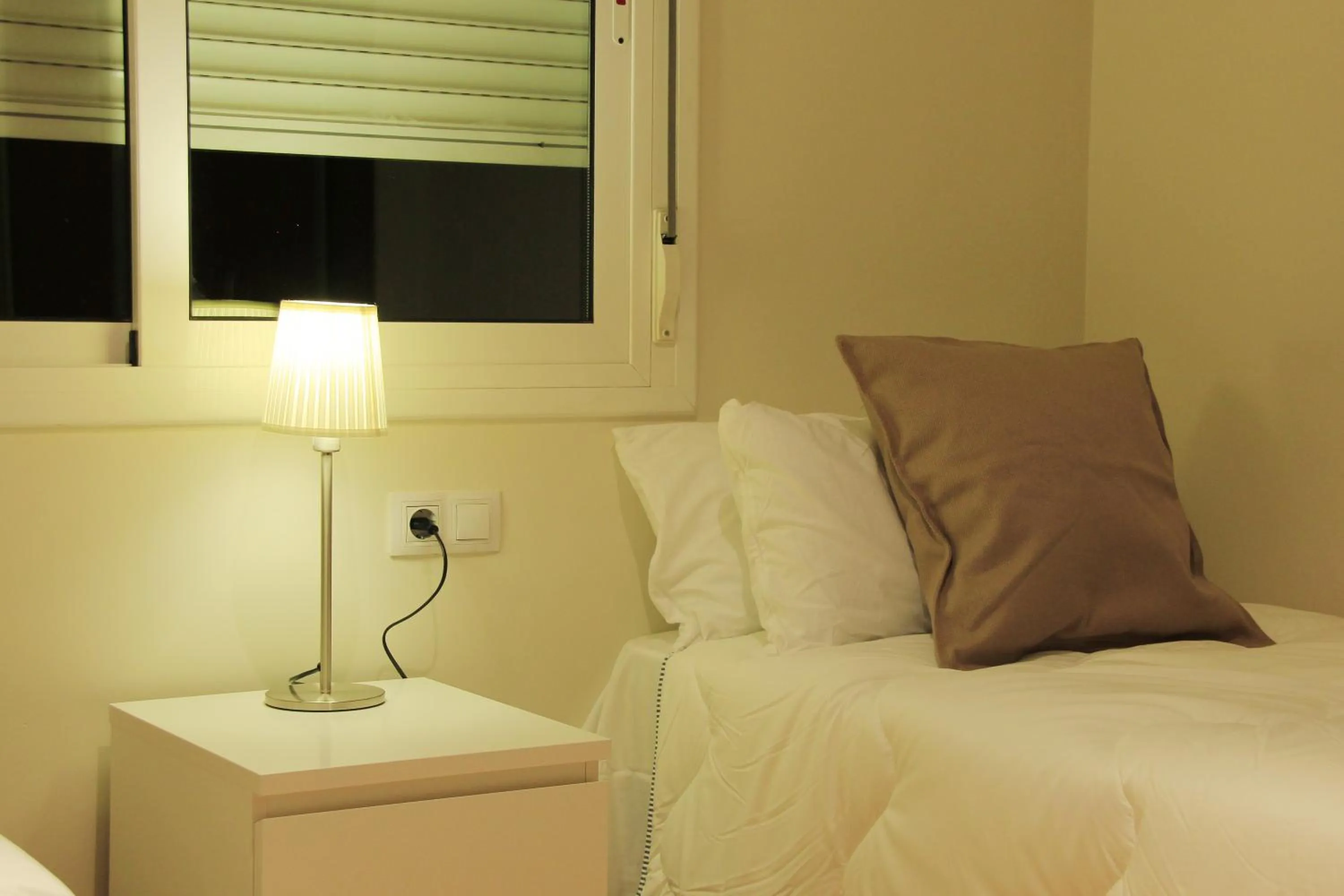 Bed in Alguera Apartments Industria