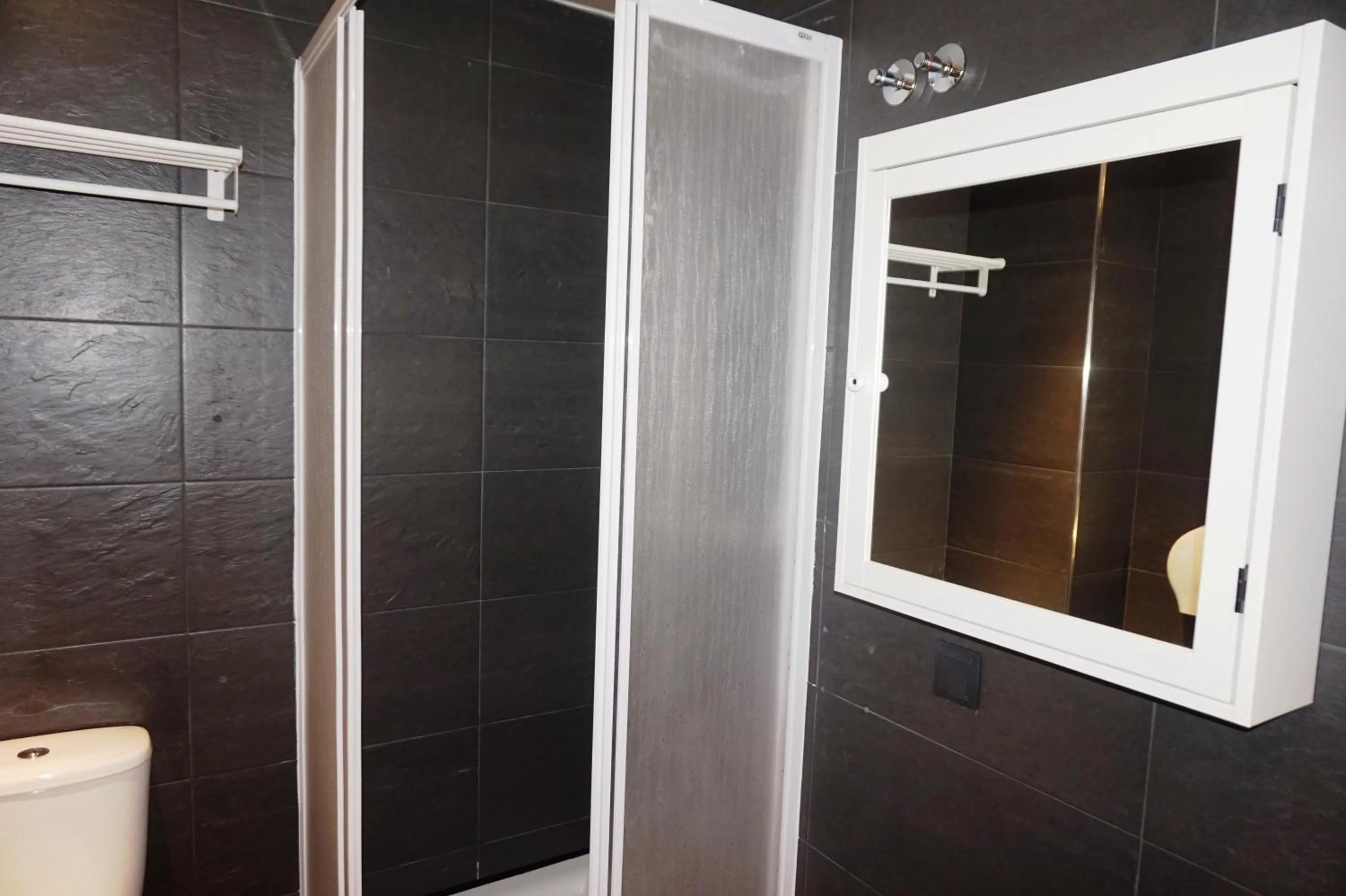 Shower in Far Home Atocha