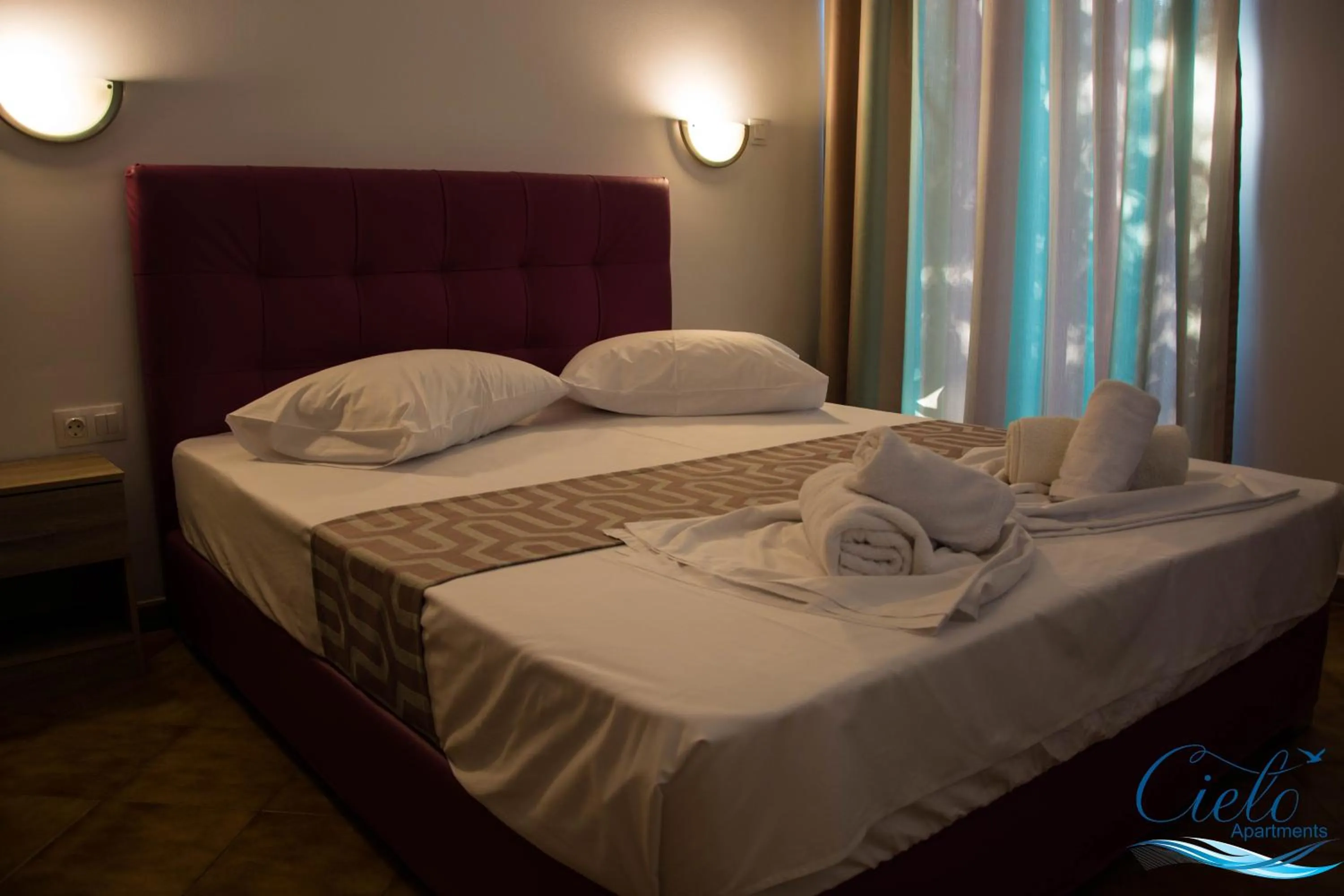 Bed in Cielo Apartments