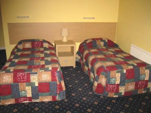 Bed in The Langham Hotel