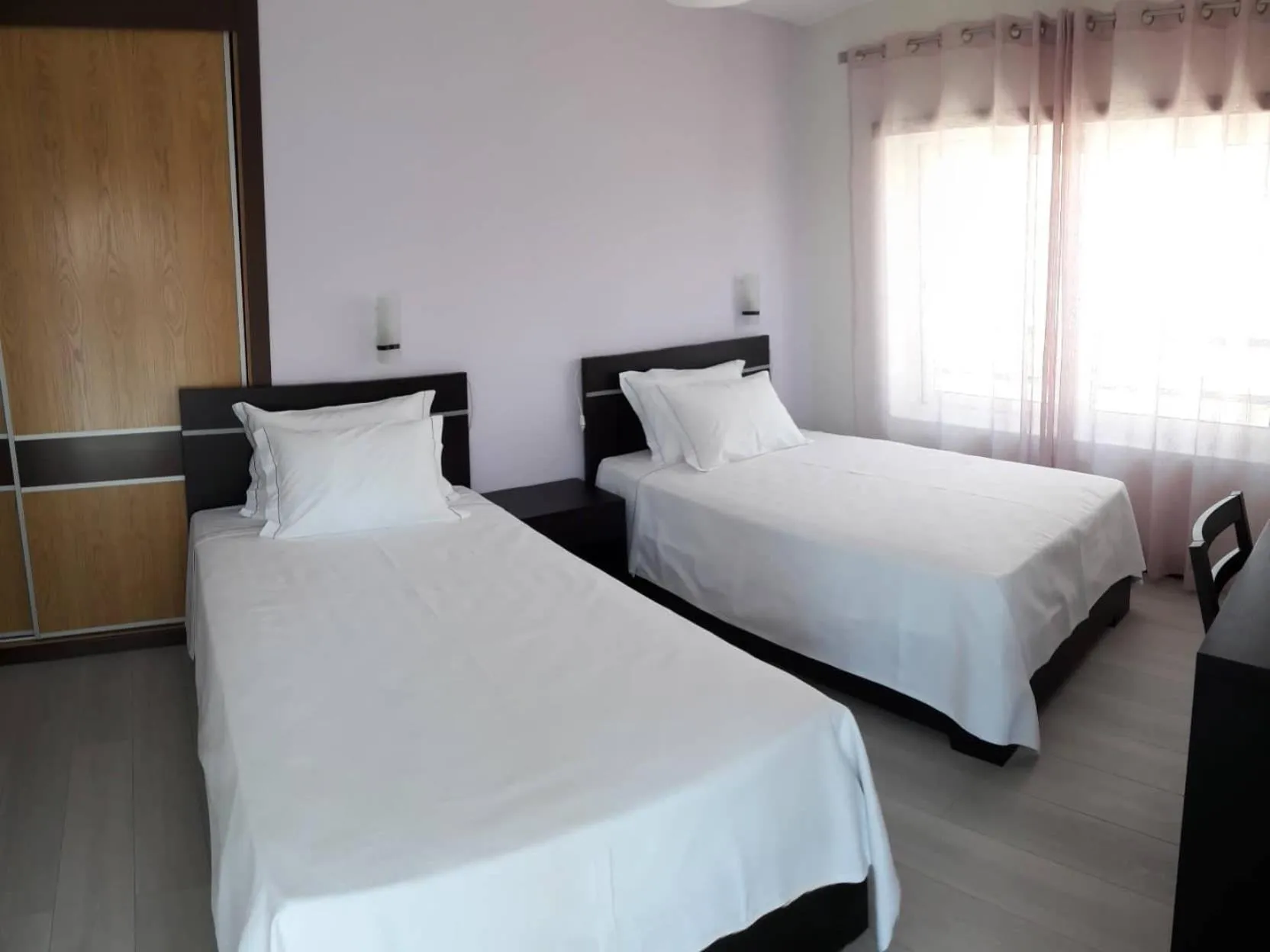 Bed in Pousada Tires Guest House