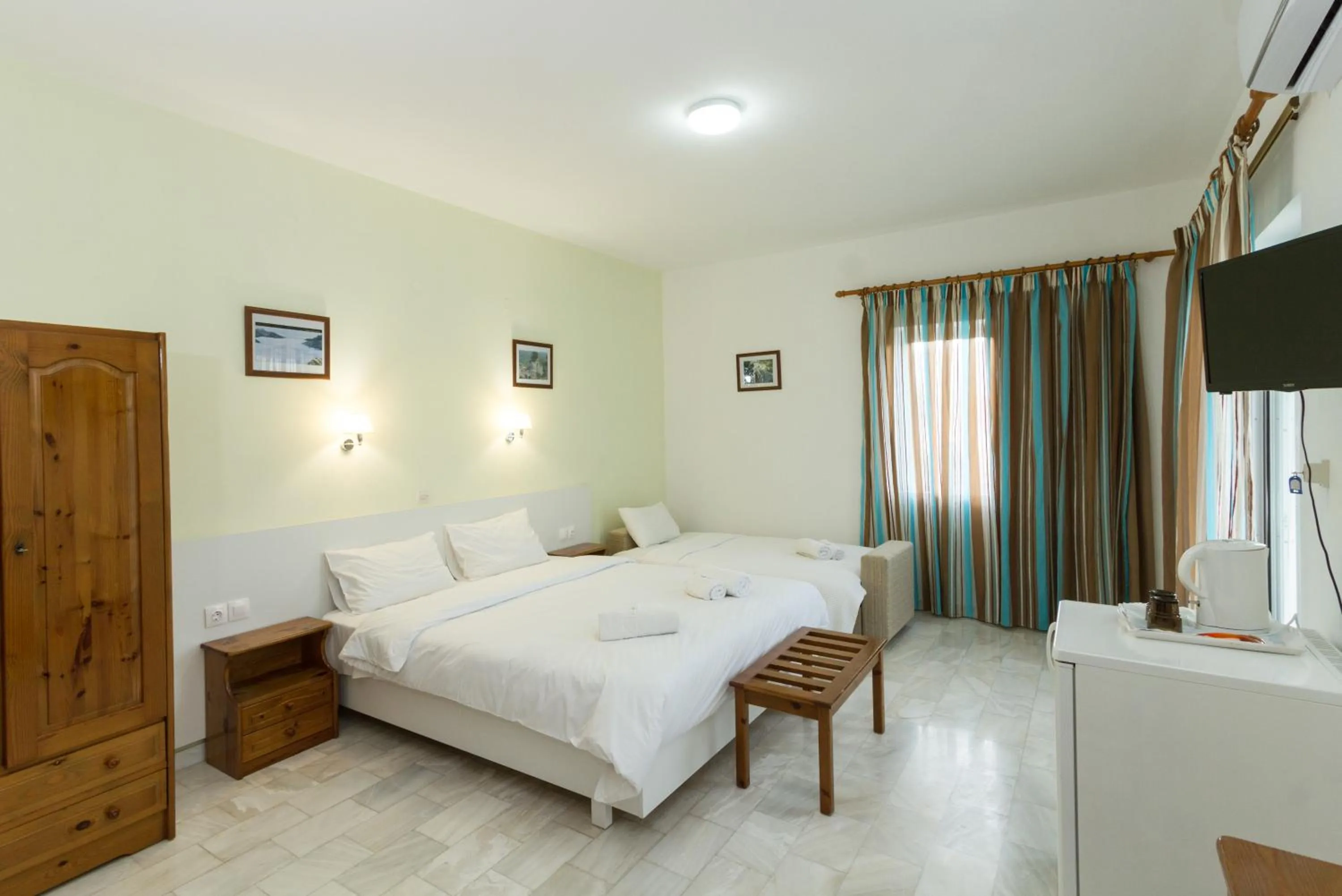 Bedroom in Revekka Rooms