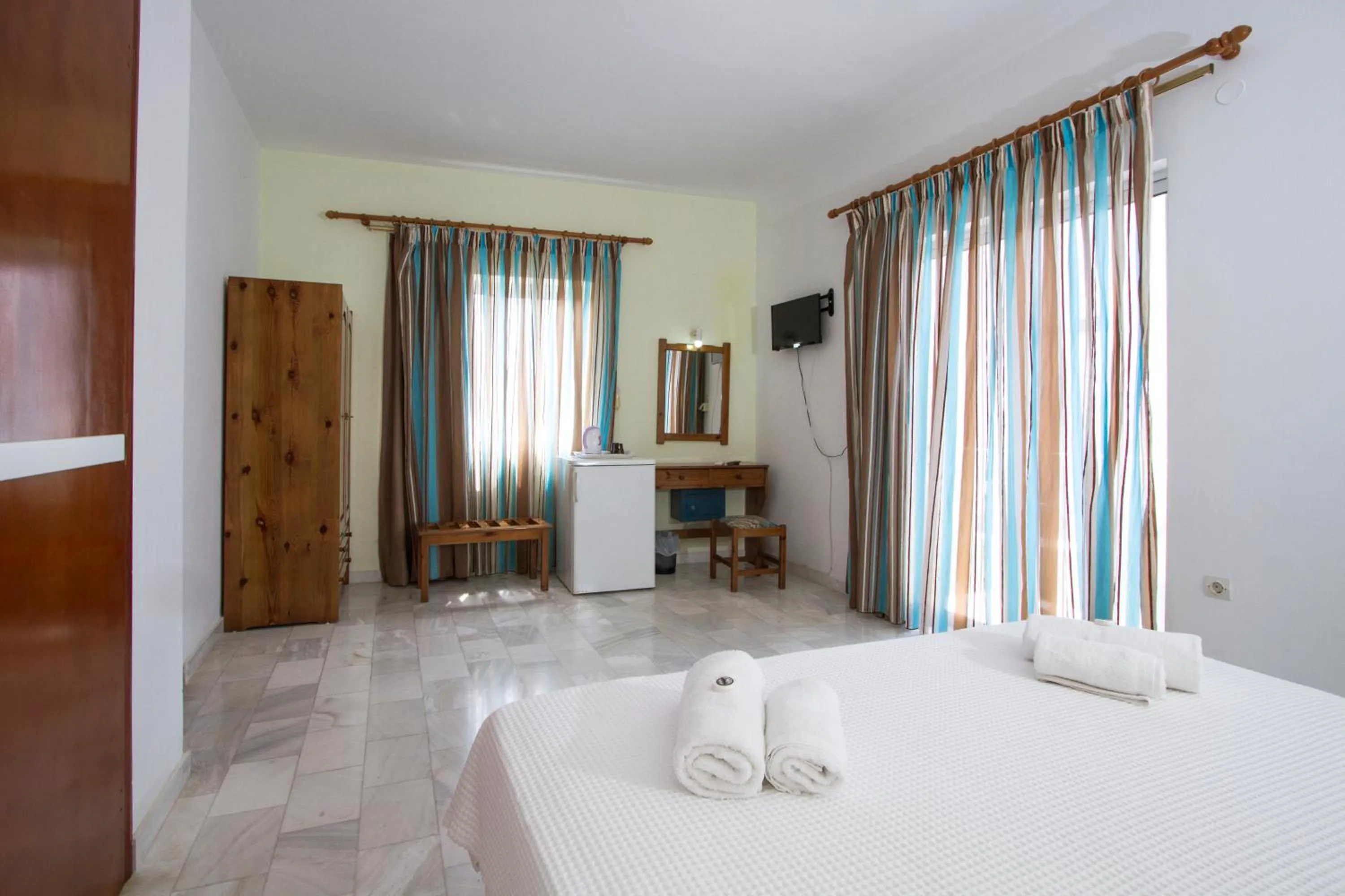 Bedroom in Revekka Rooms