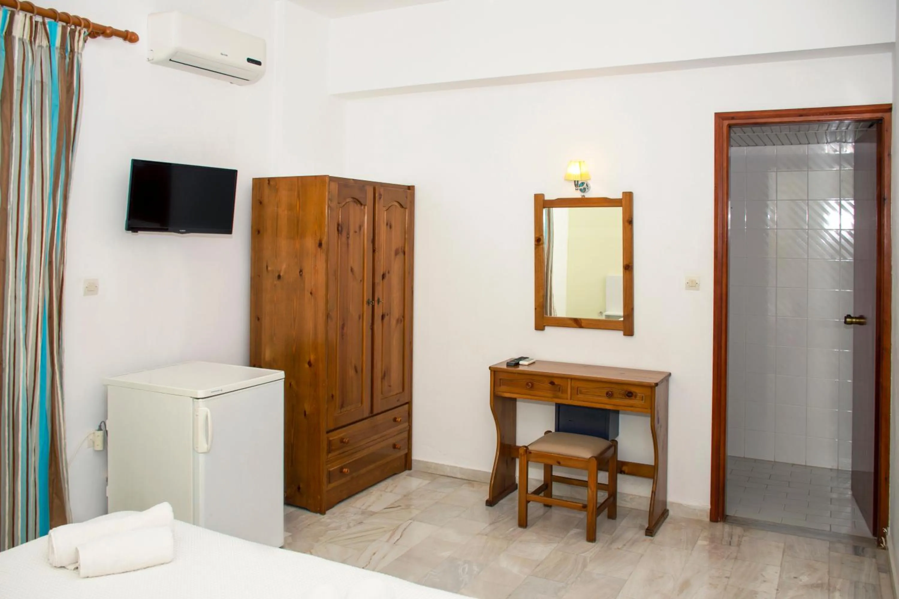 Bedroom in Revekka Rooms