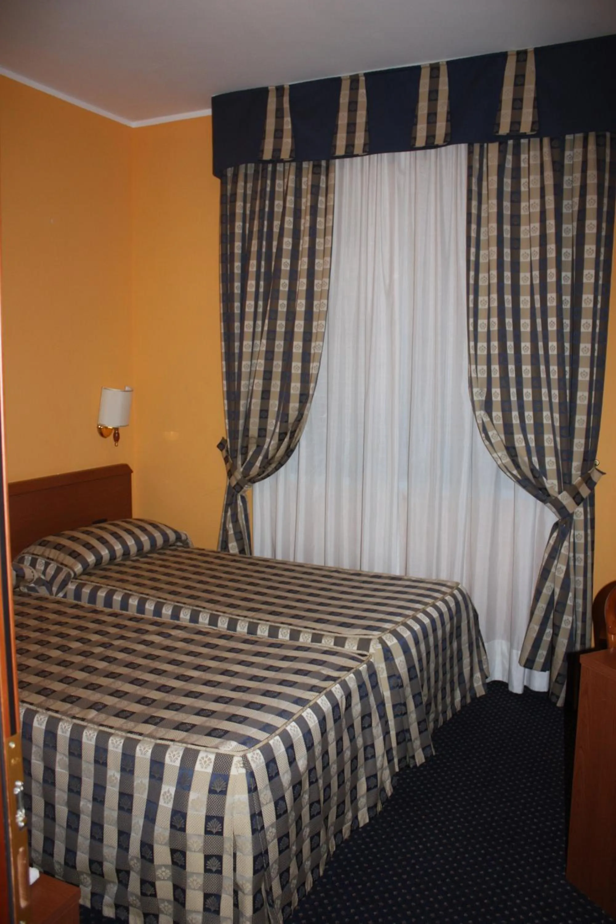 Bed in Hotel Tre Denti
