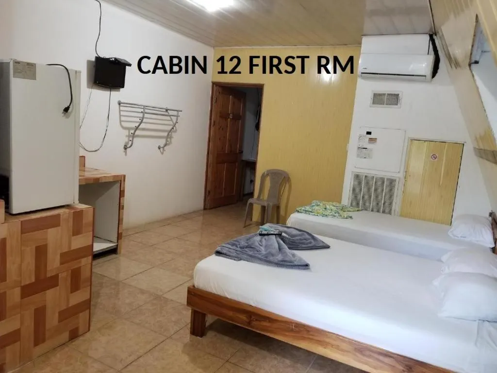 Bed in Mapi's Cabins