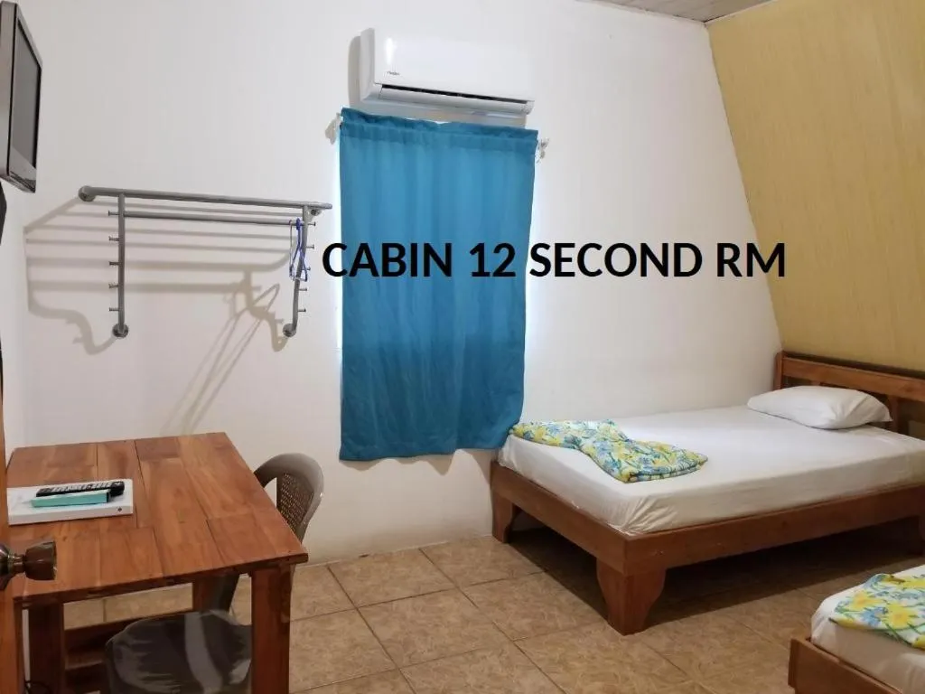 Bed in Mapi's Cabins