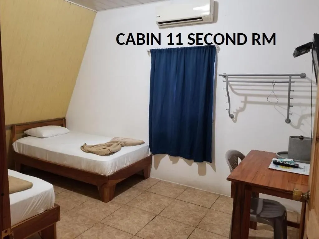 Bed in Mapi's Cabins