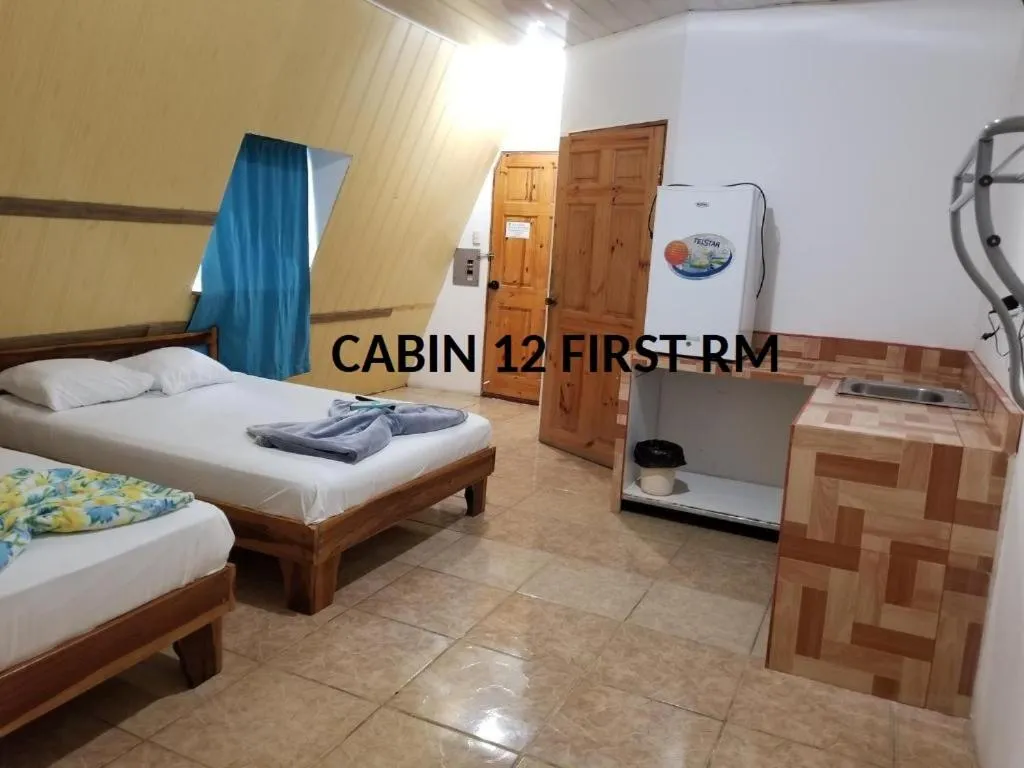 Bed in Mapi's Cabins