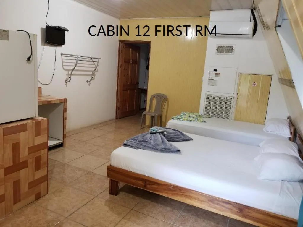 Bed in Mapi's Cabins