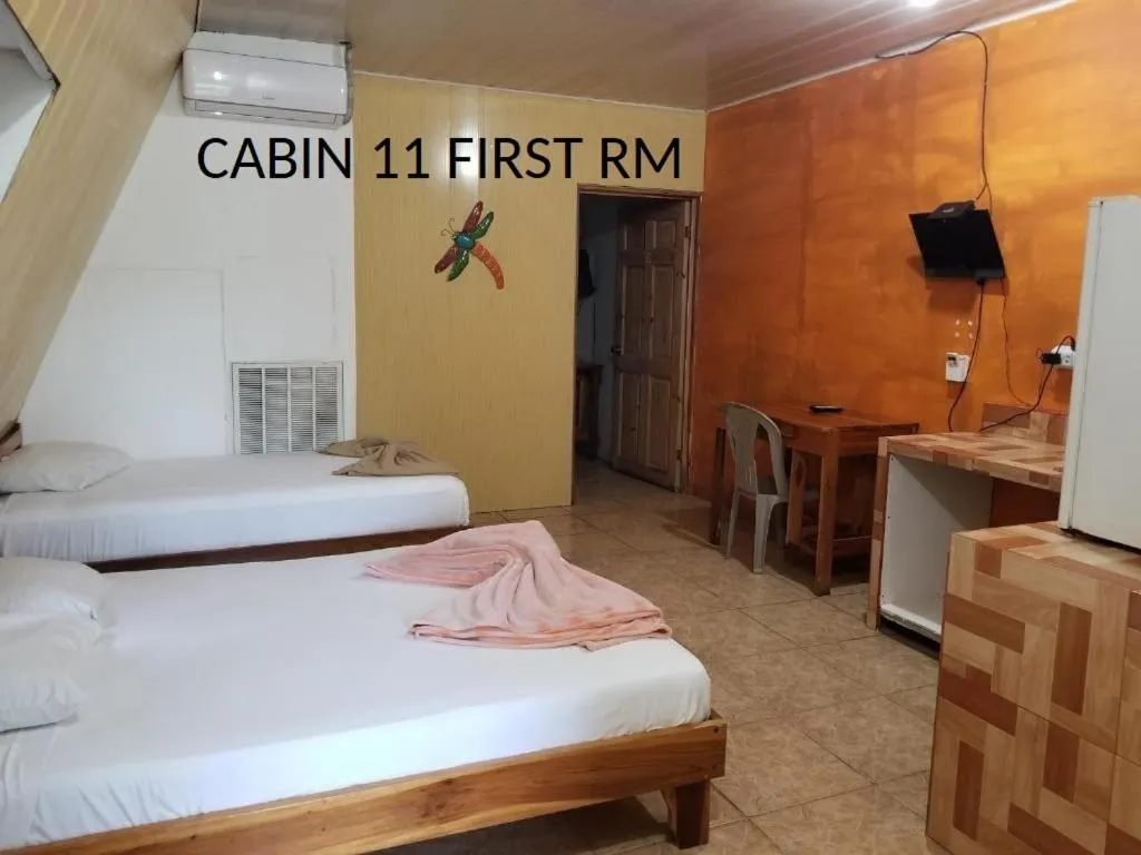 Bed in Mapi's Cabins