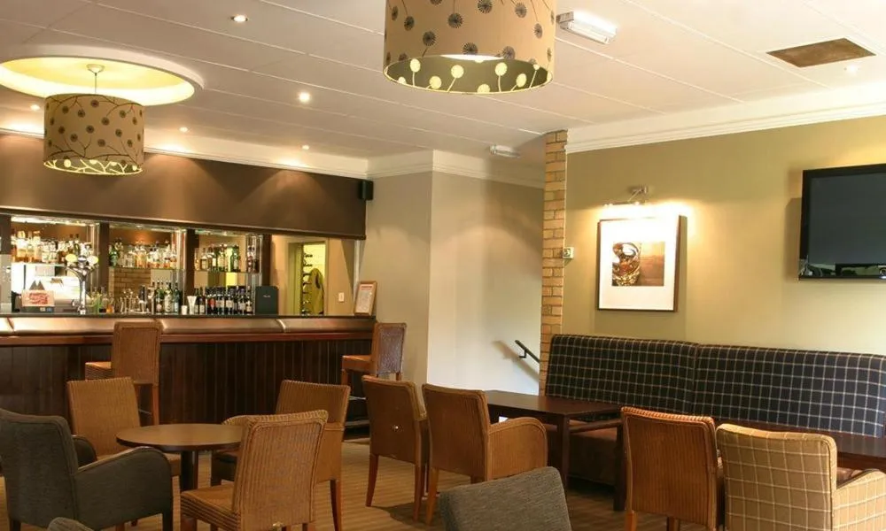 Lounge or bar in Eight Acres Hotel