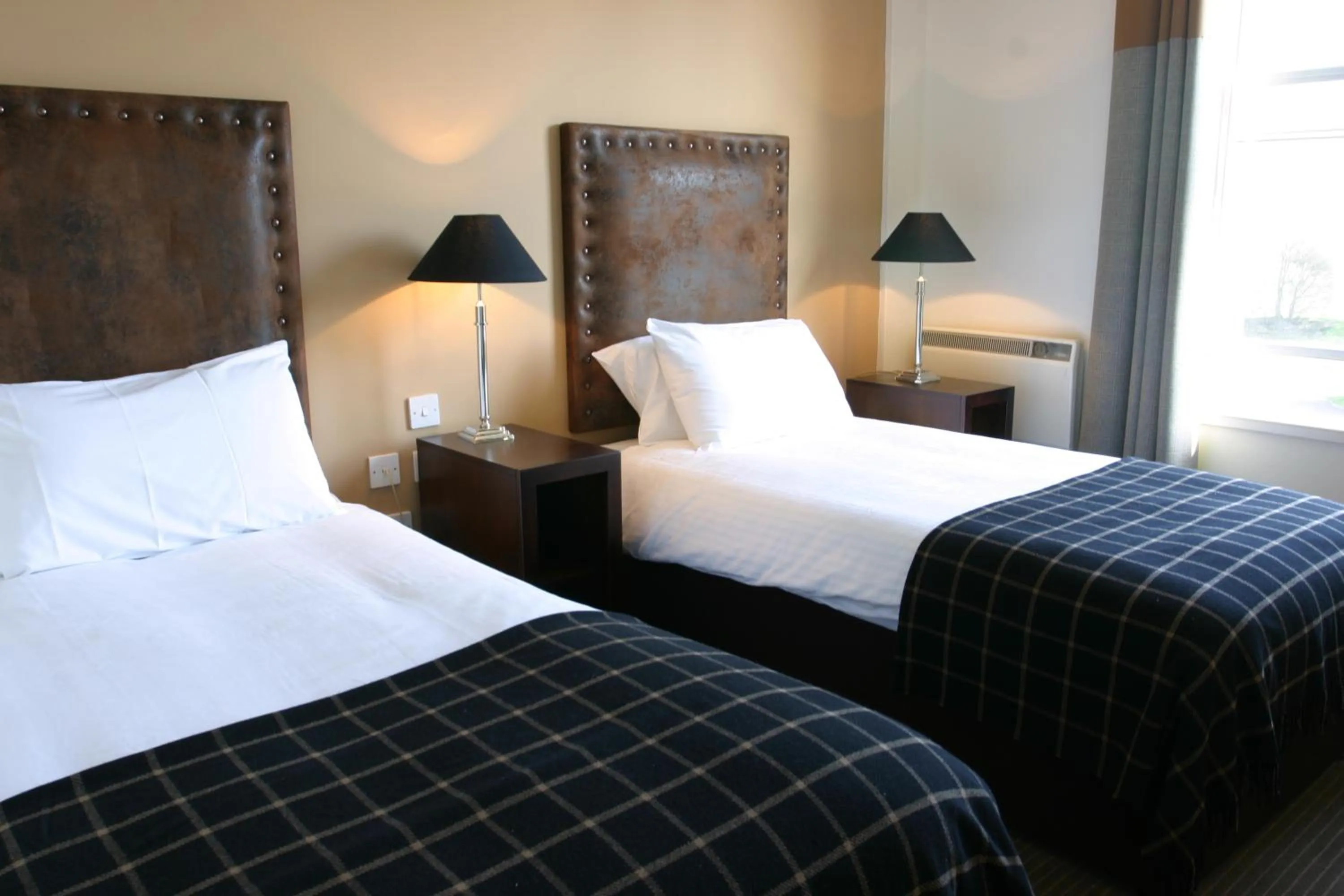 Bed in Eight Acres Hotel