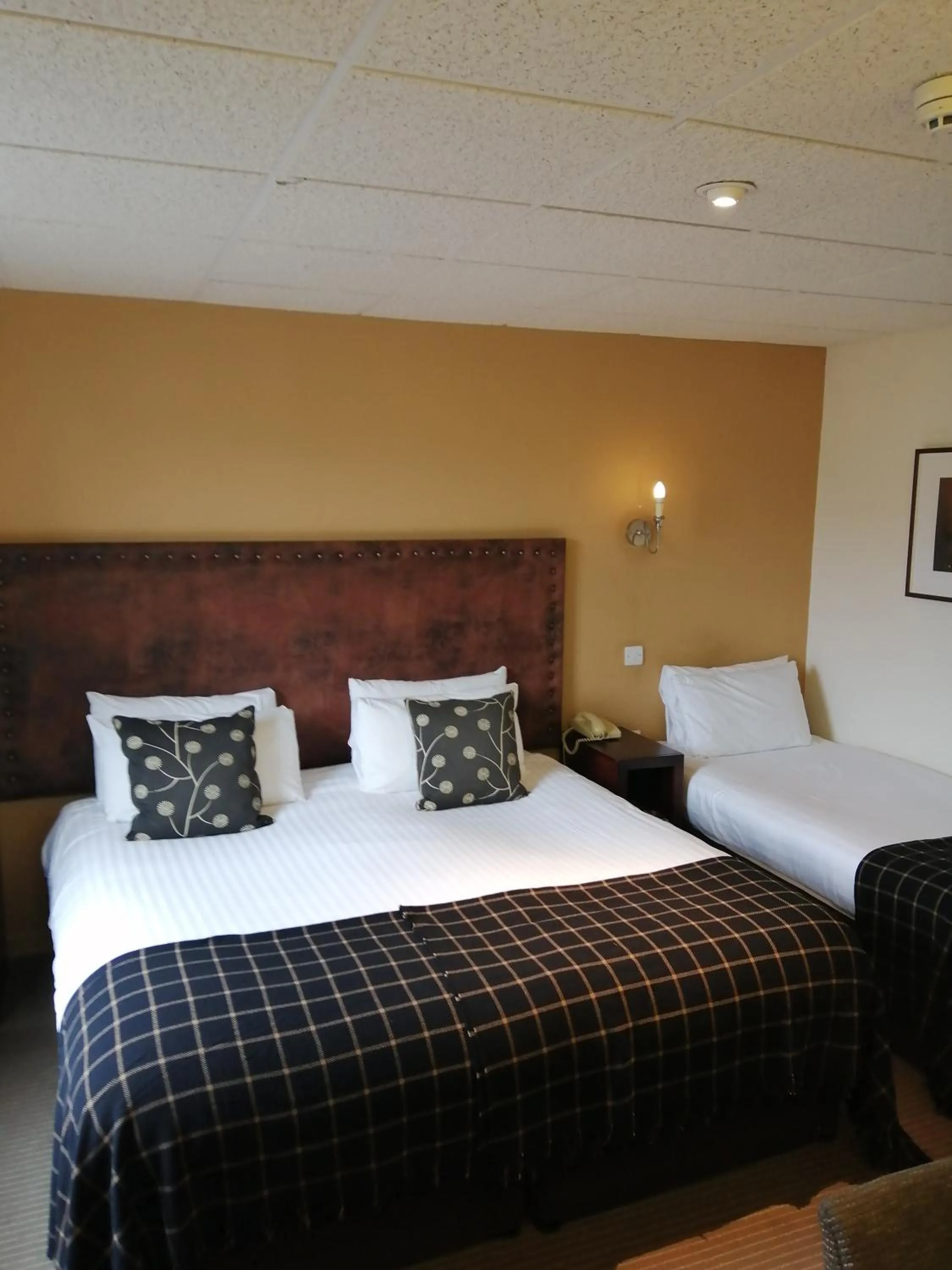 Bed in Eight Acres Hotel