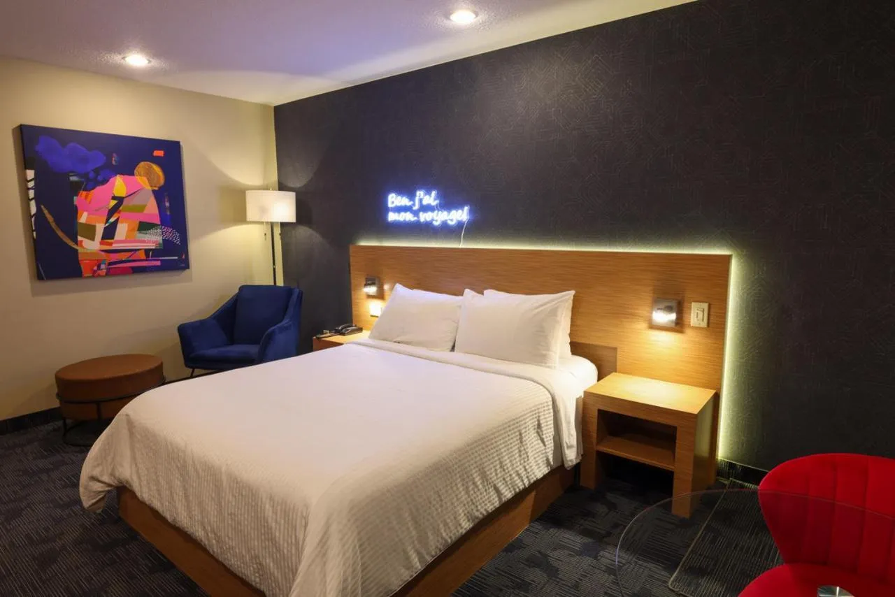 Bed in Le Fabreville Motel & Suites