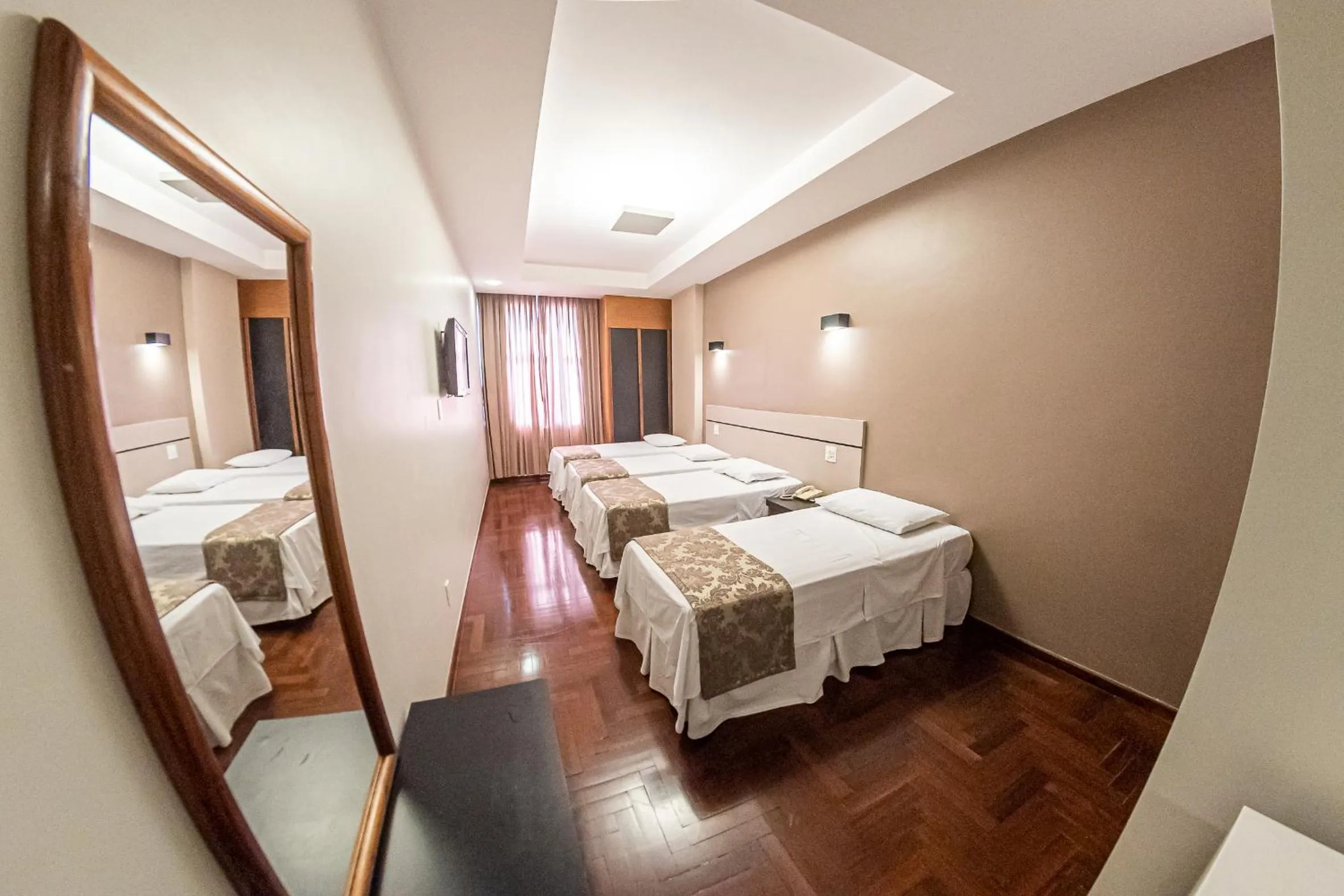 Bed in Serrano Residencial Hotel