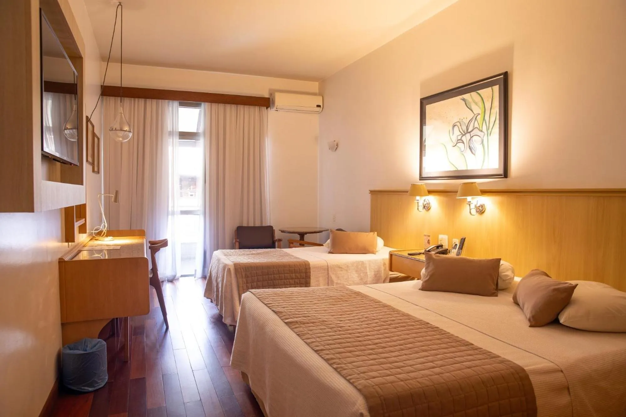 Bed in Ritz Plaza Hotel