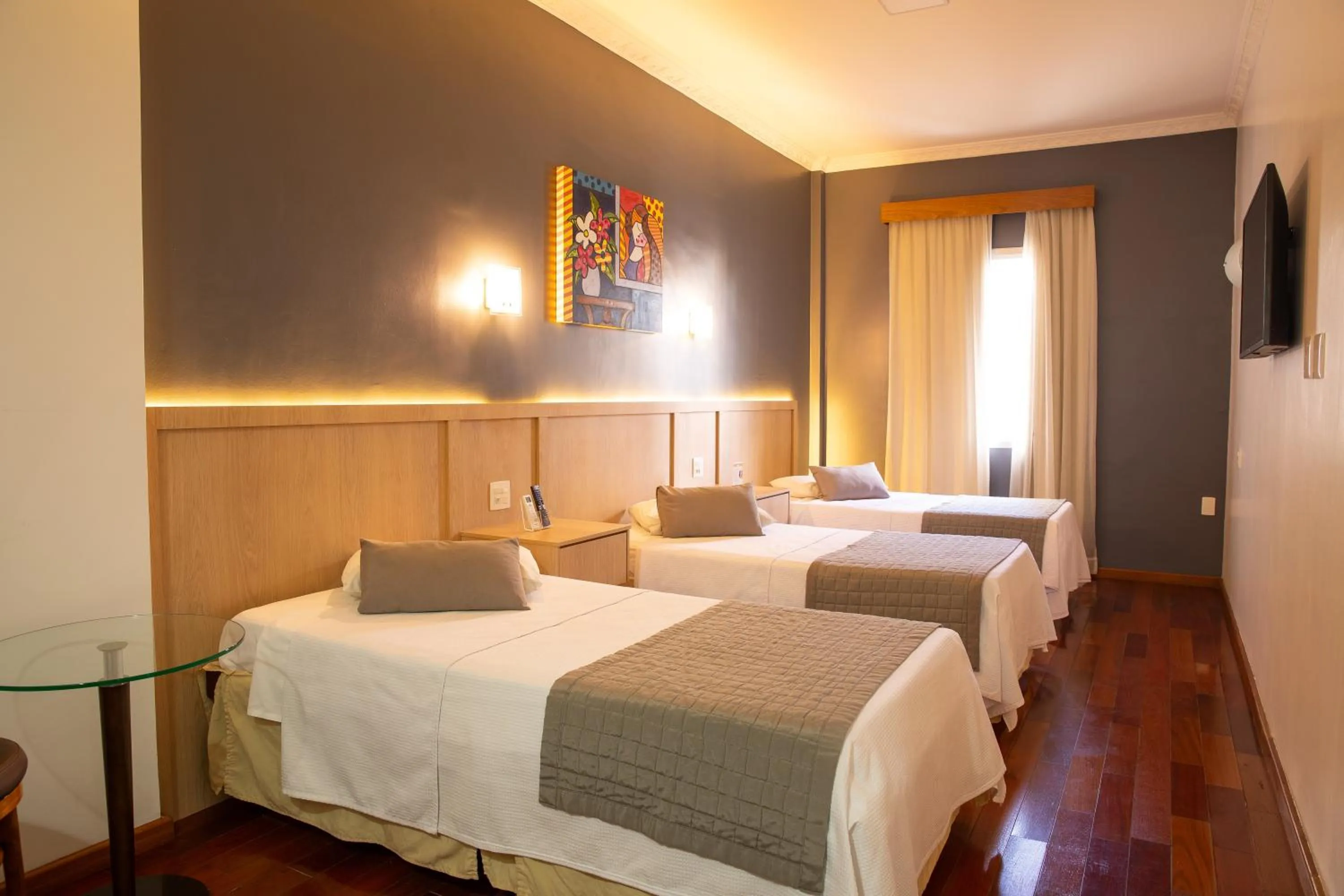 Bed in Ritz Plaza Hotel