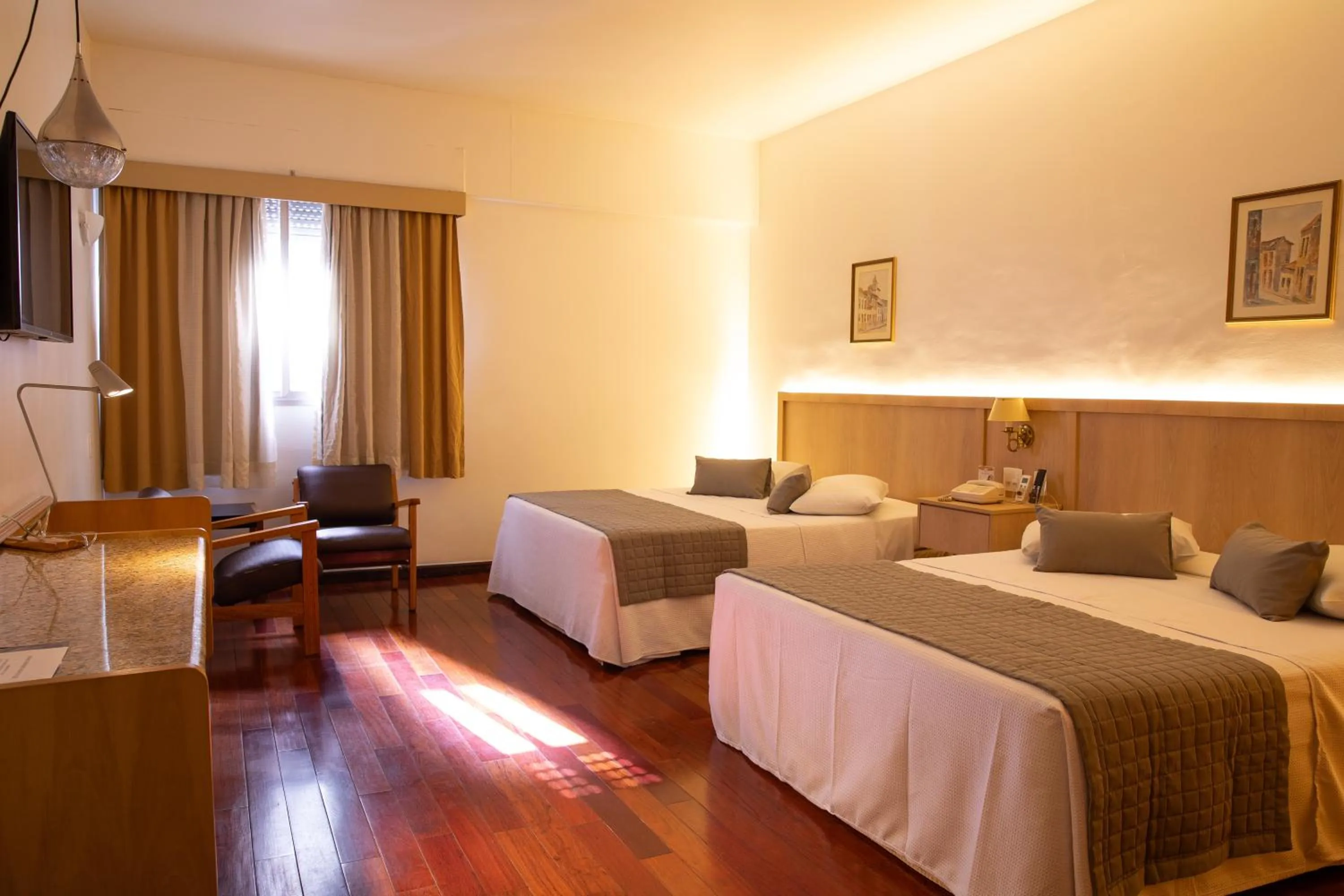 Bed in Ritz Plaza Hotel