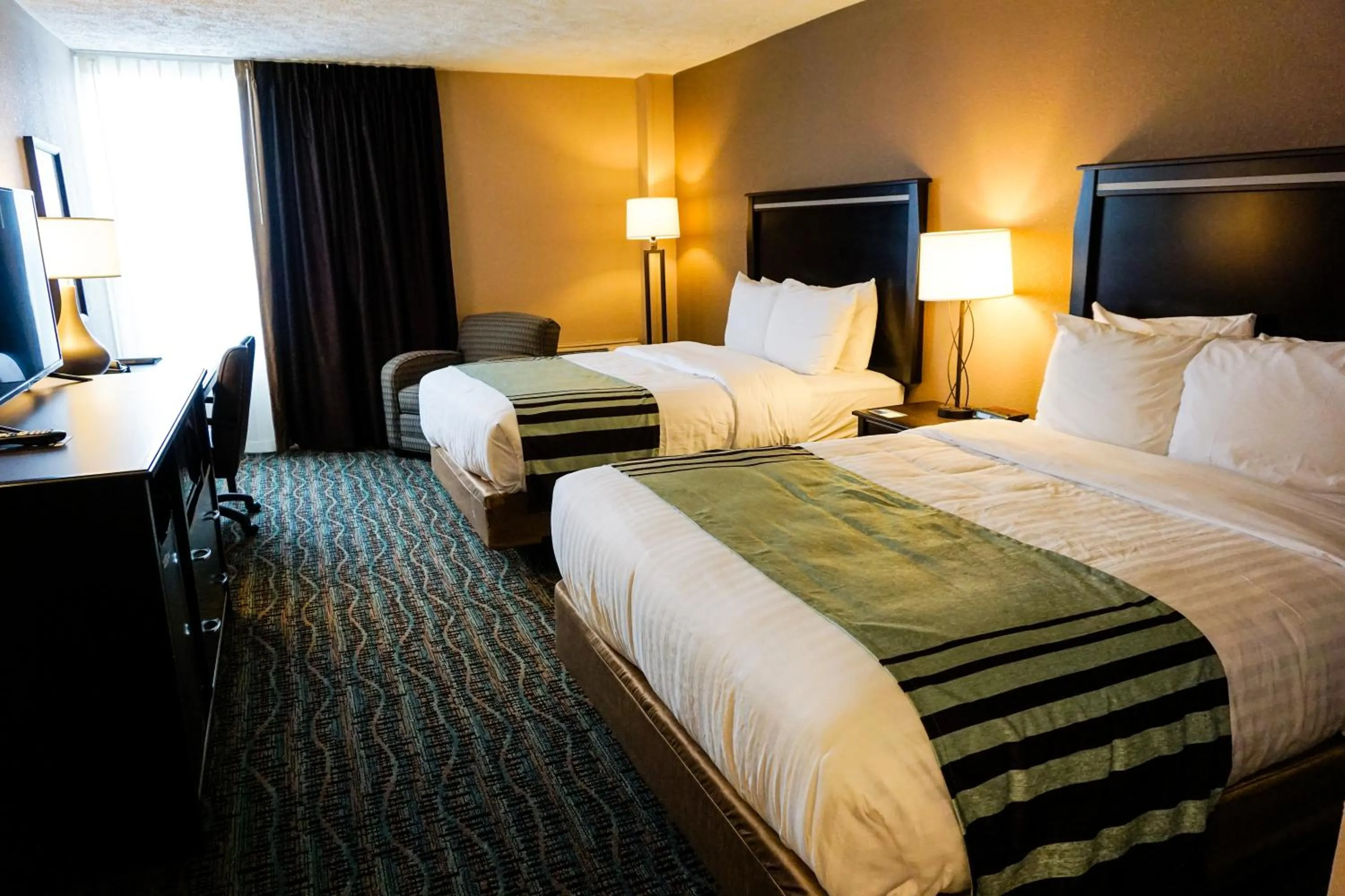 Bedroom in Boarders Inn & Suites by Cobblestone Hotels - Grand Island