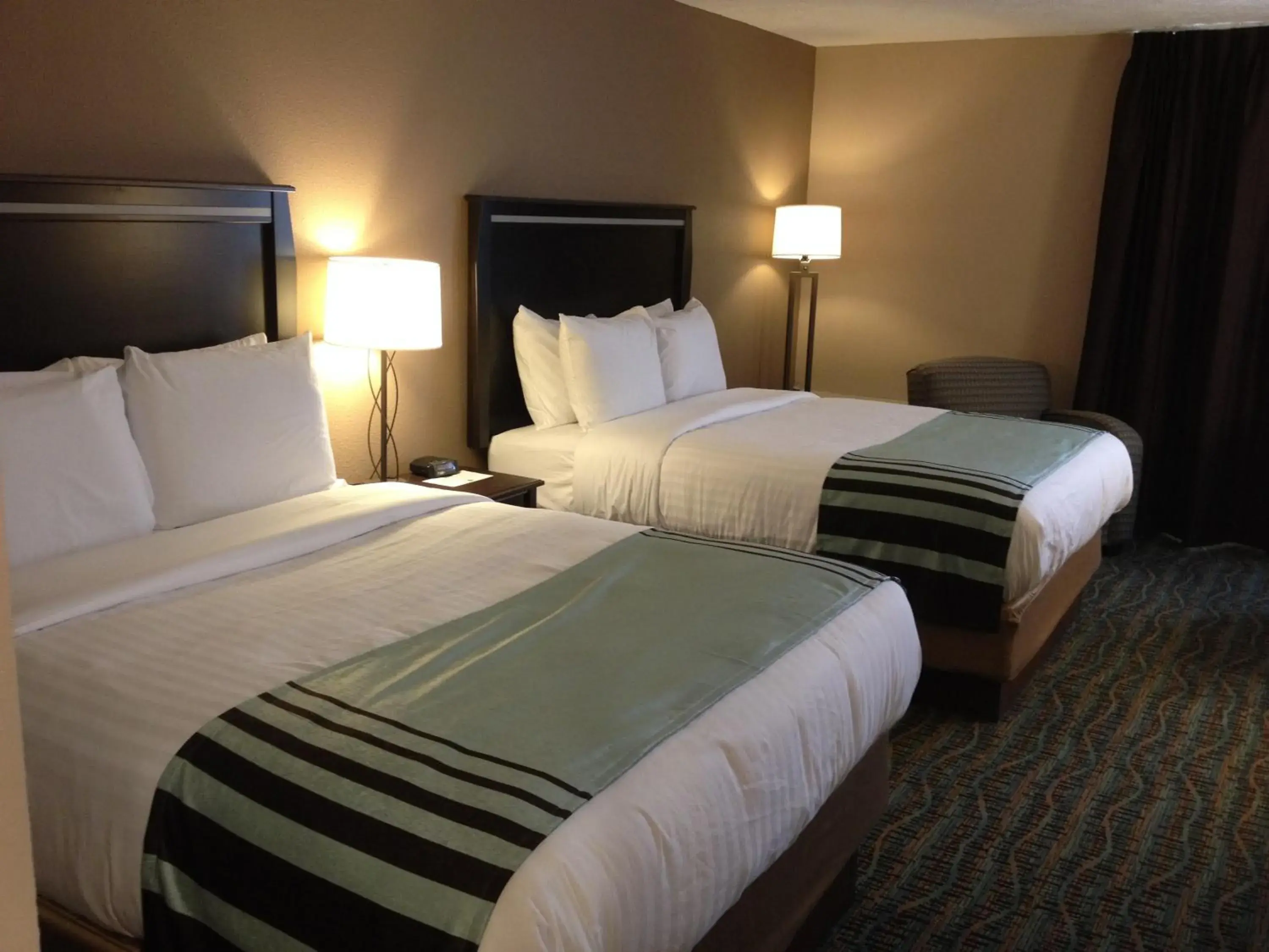 Queen Room with Two Queen Beds in Boarders Inn & Suites by Cobblestone Hotels - Grand Island Queen Room with Two Queen Beds in Boarders Inn & Suites by Cobblestone Hotels - Grand Island