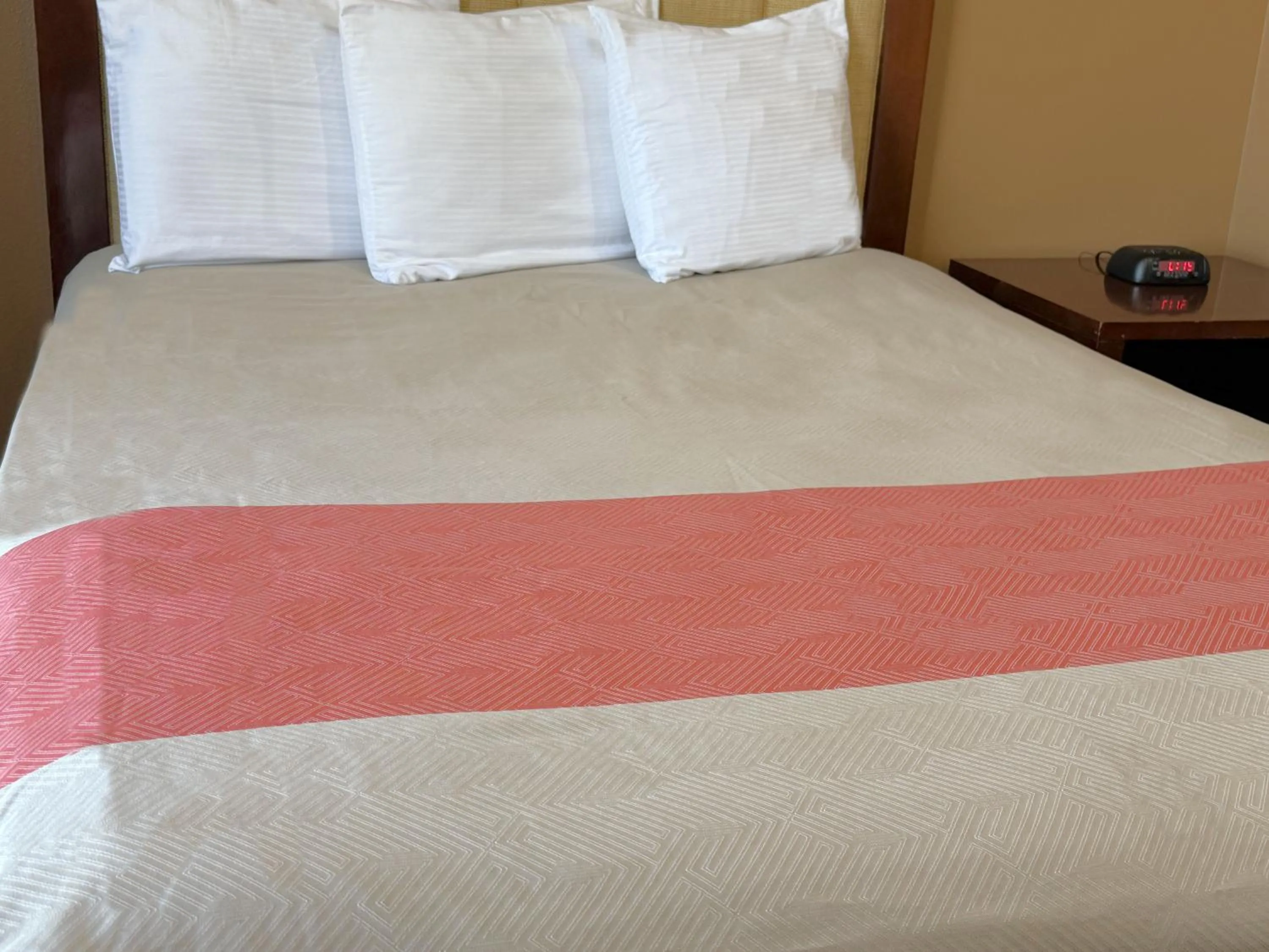 Bed in TownHouse Extended Stay Hotel Downtown