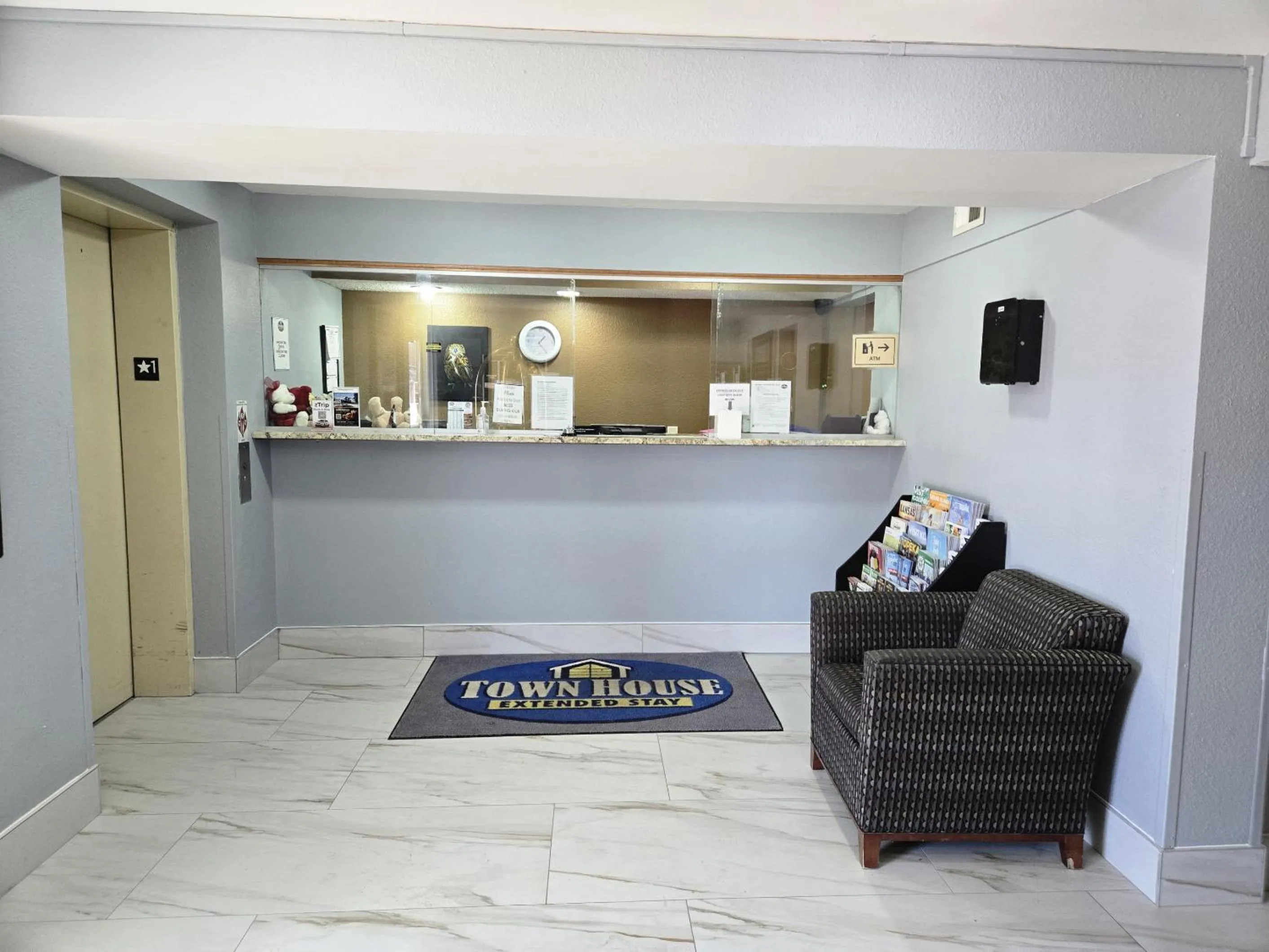 Property building in TownHouse Extended Stay Hotel Downtown