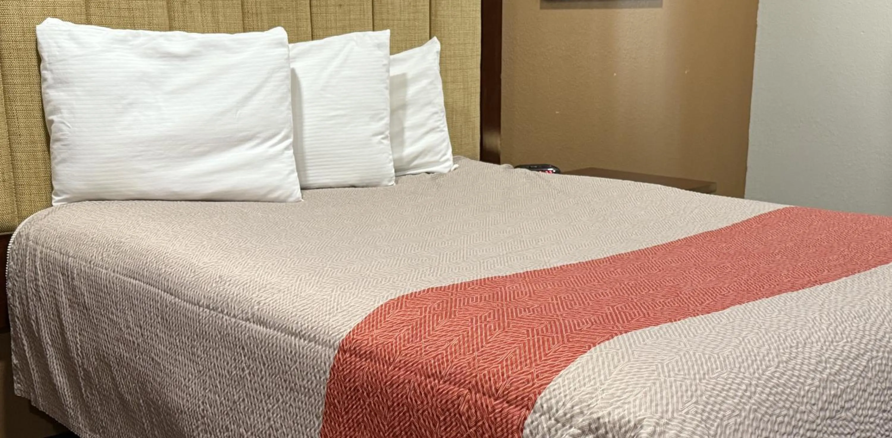 Bed in TownHouse Extended Stay Hotel Downtown