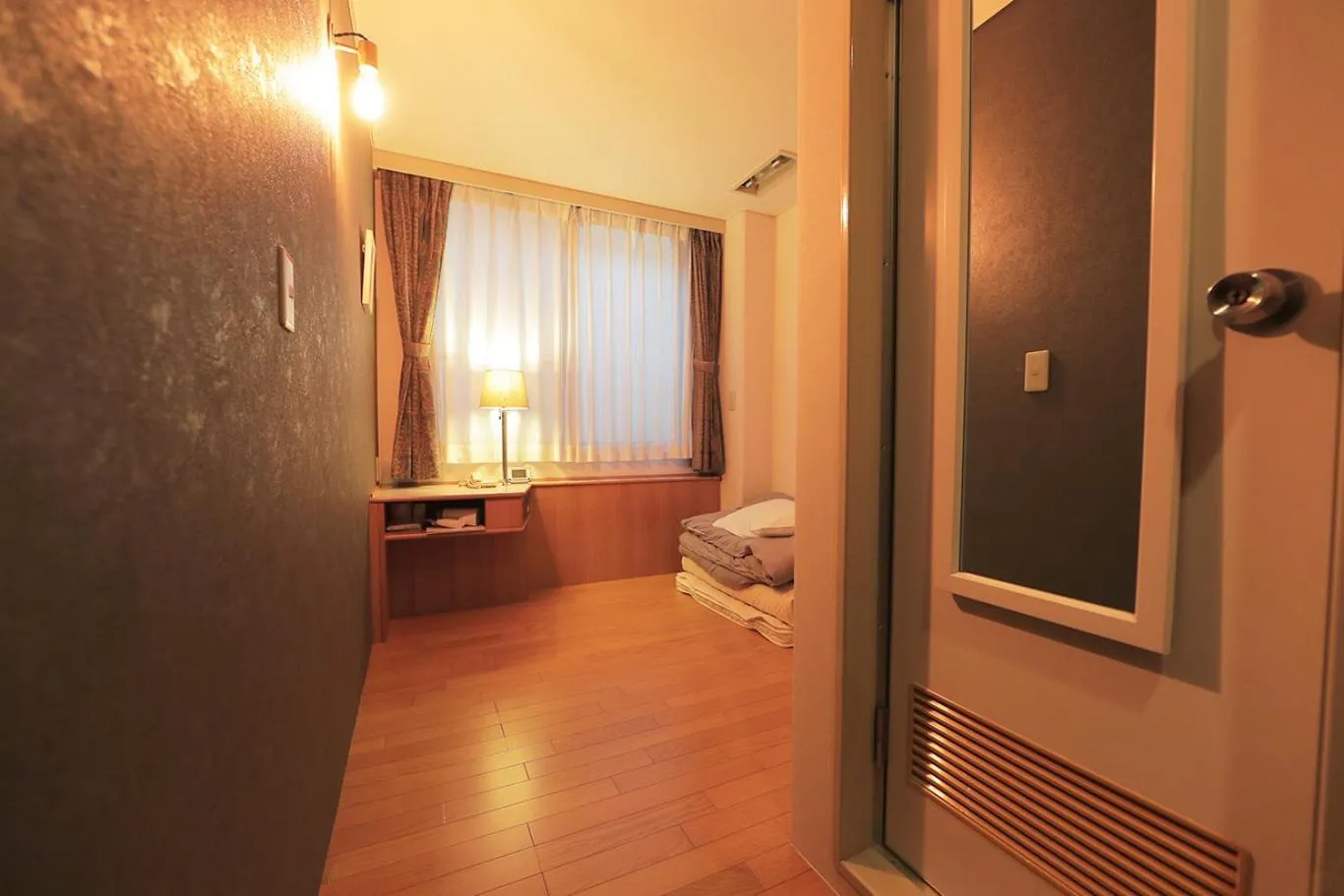 Bed in Hotel Sun Garden Matsuyama