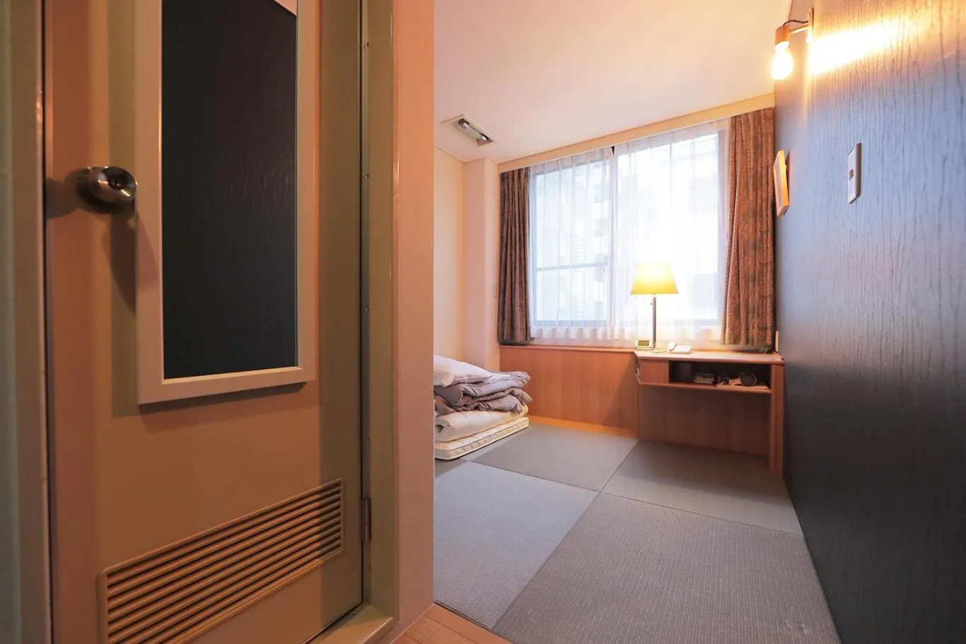 Bed in Hotel Sun Garden Matsuyama