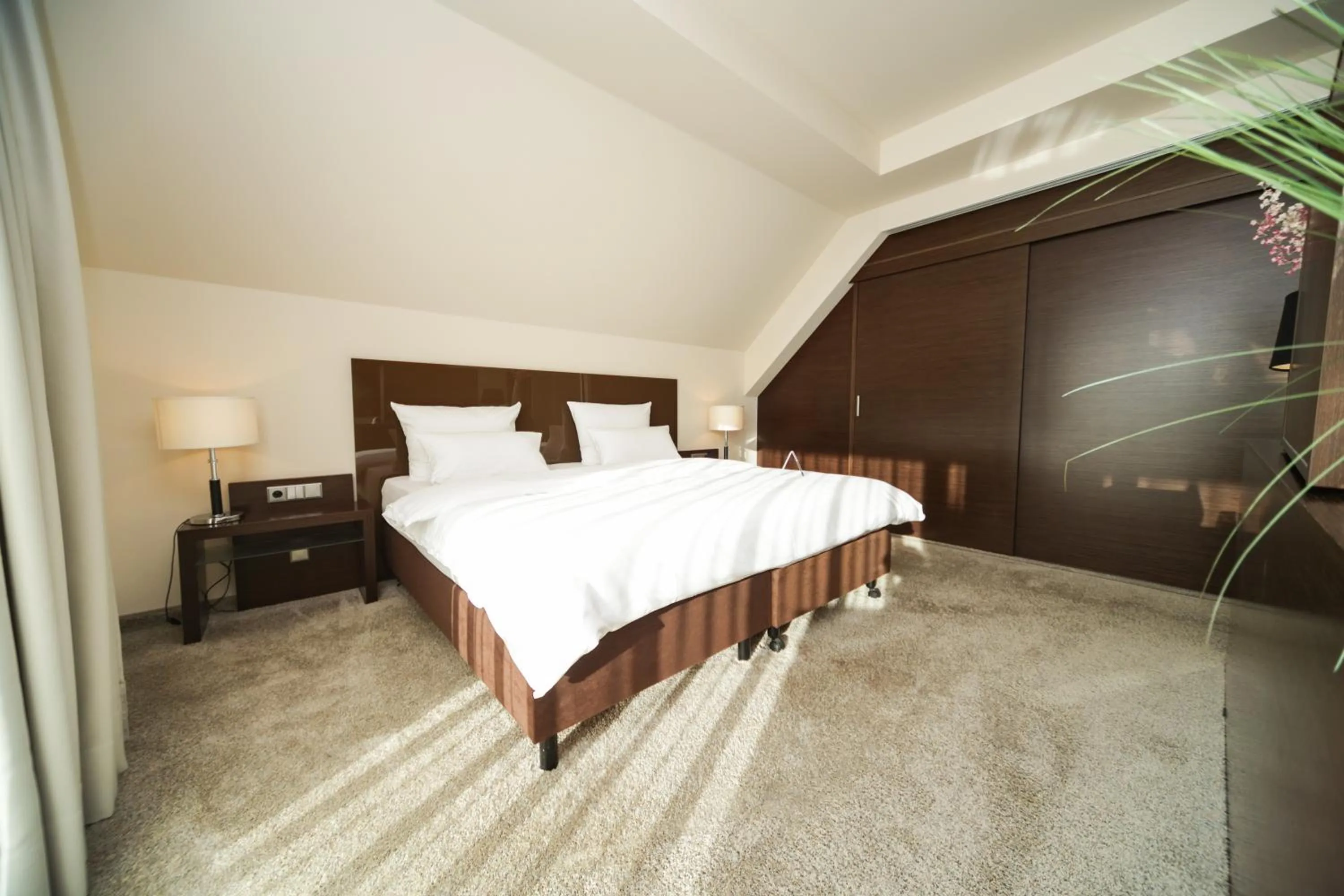 Bed in l'Arrivée Hotel & Spa