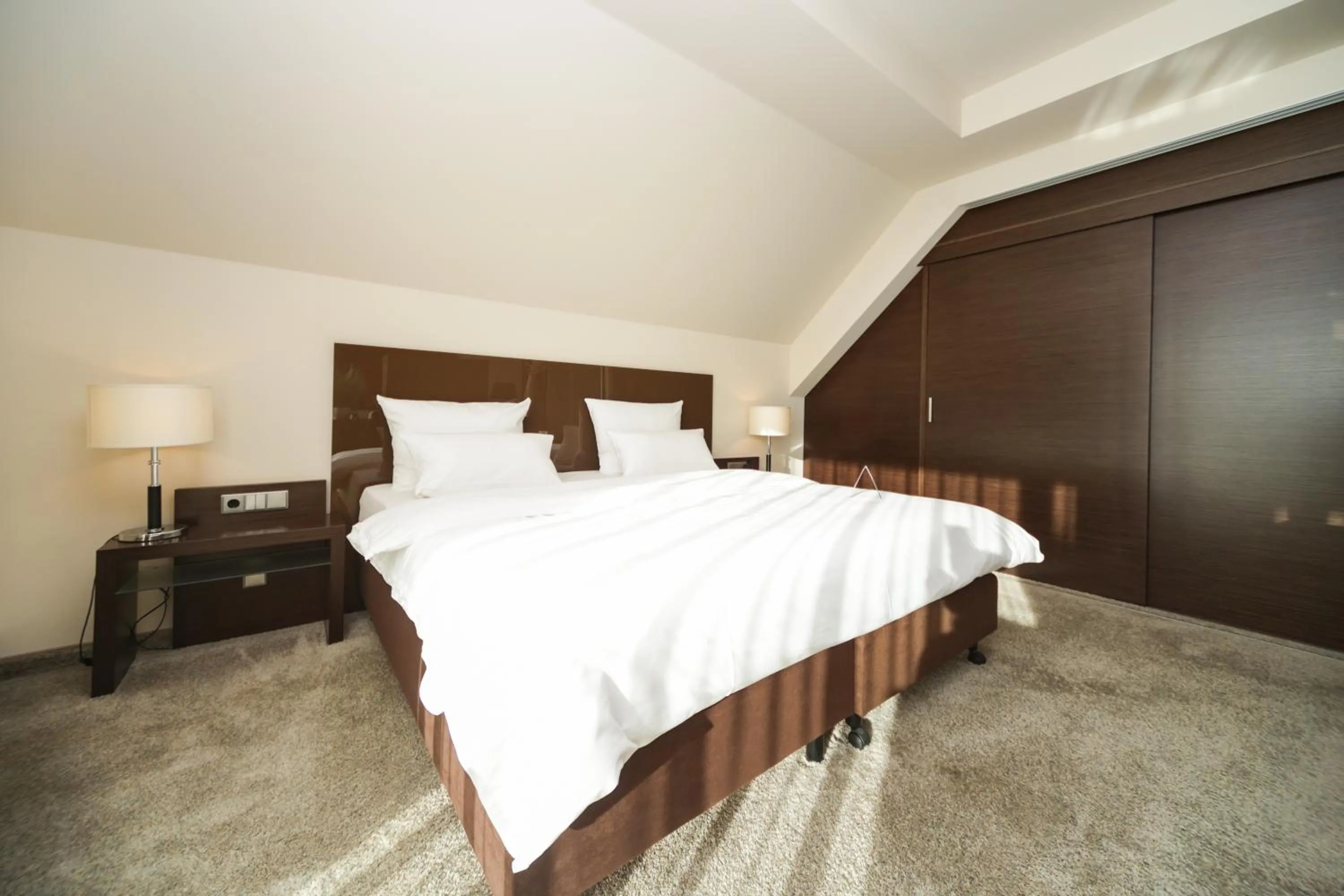 Bed in l'Arrivée Hotel & Spa