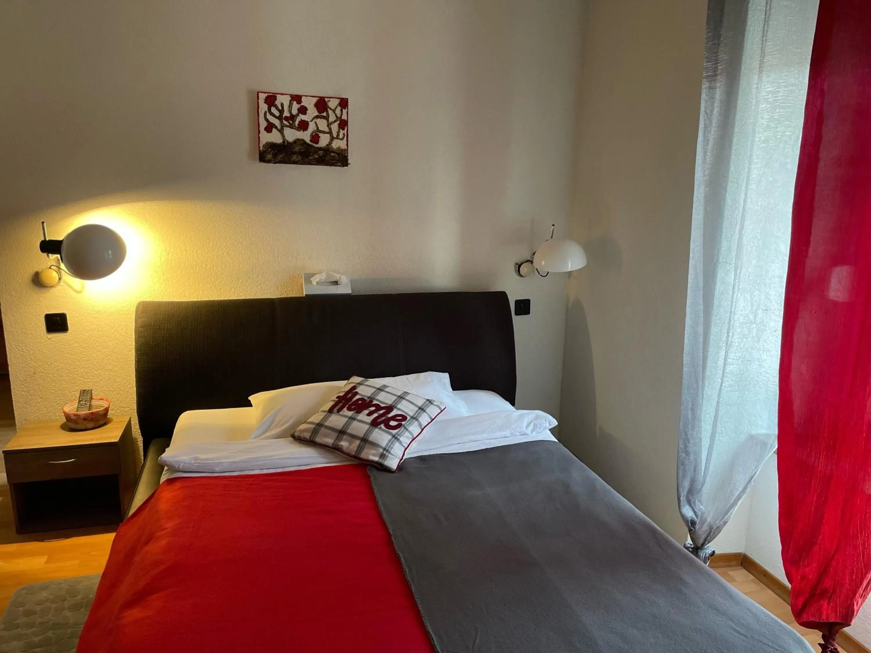 Bed in Hôtel La Fontaine