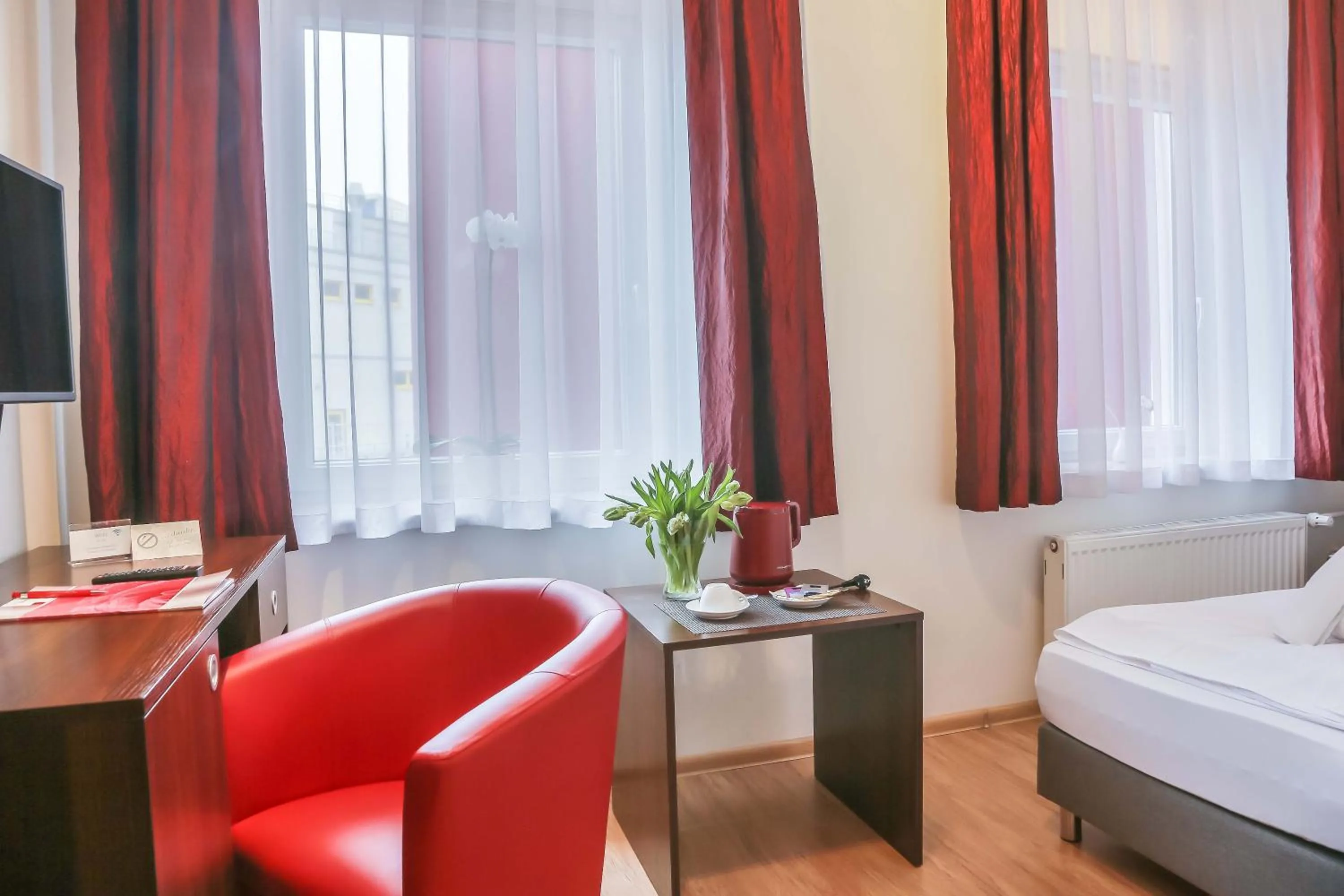 Photo of the whole room, Bed in City Residence Hotel Frankfurt-Oder Bahnhof
