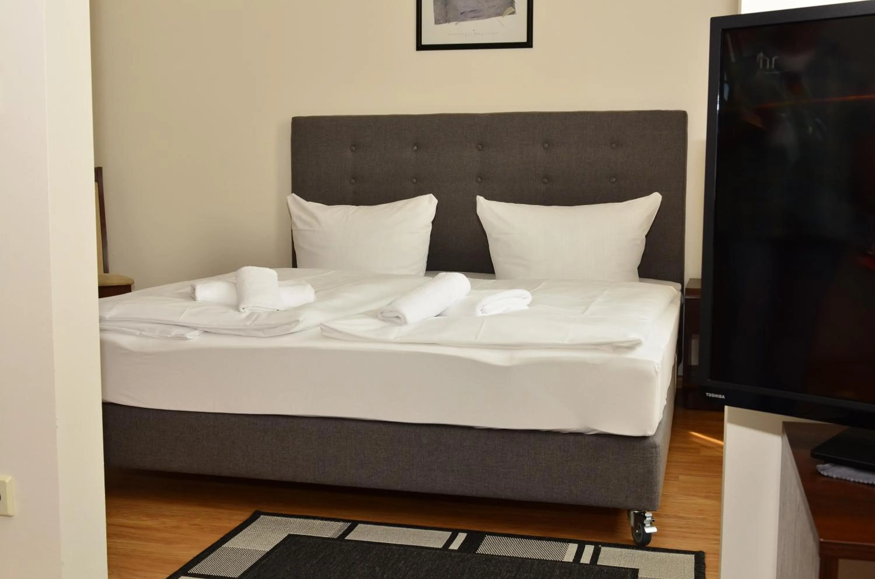 Photo of the whole room, Bed in City Residence Hotel Frankfurt-Oder Bahnhof