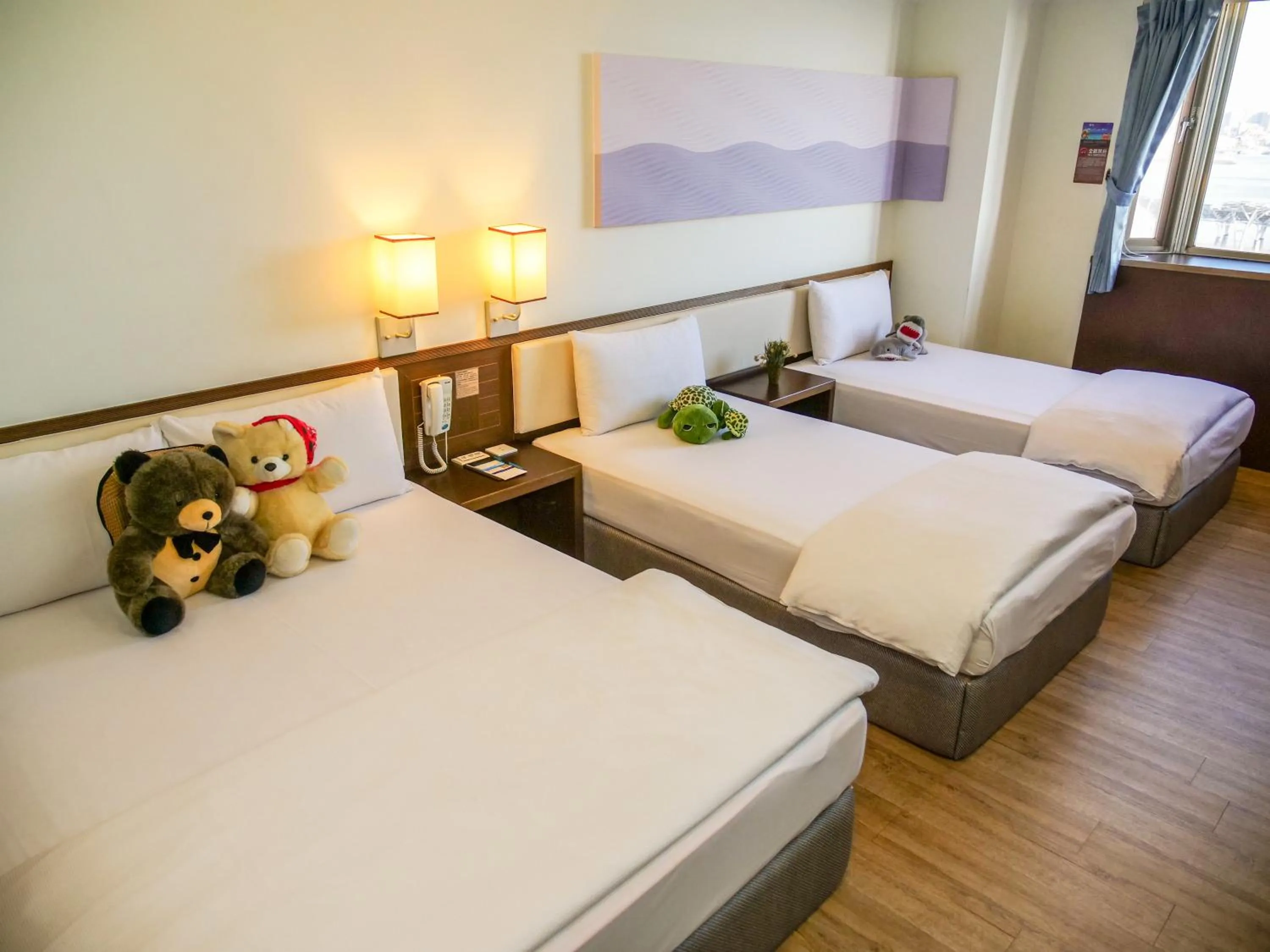 Photo of the whole room, Bed in MF Hotel, penghu