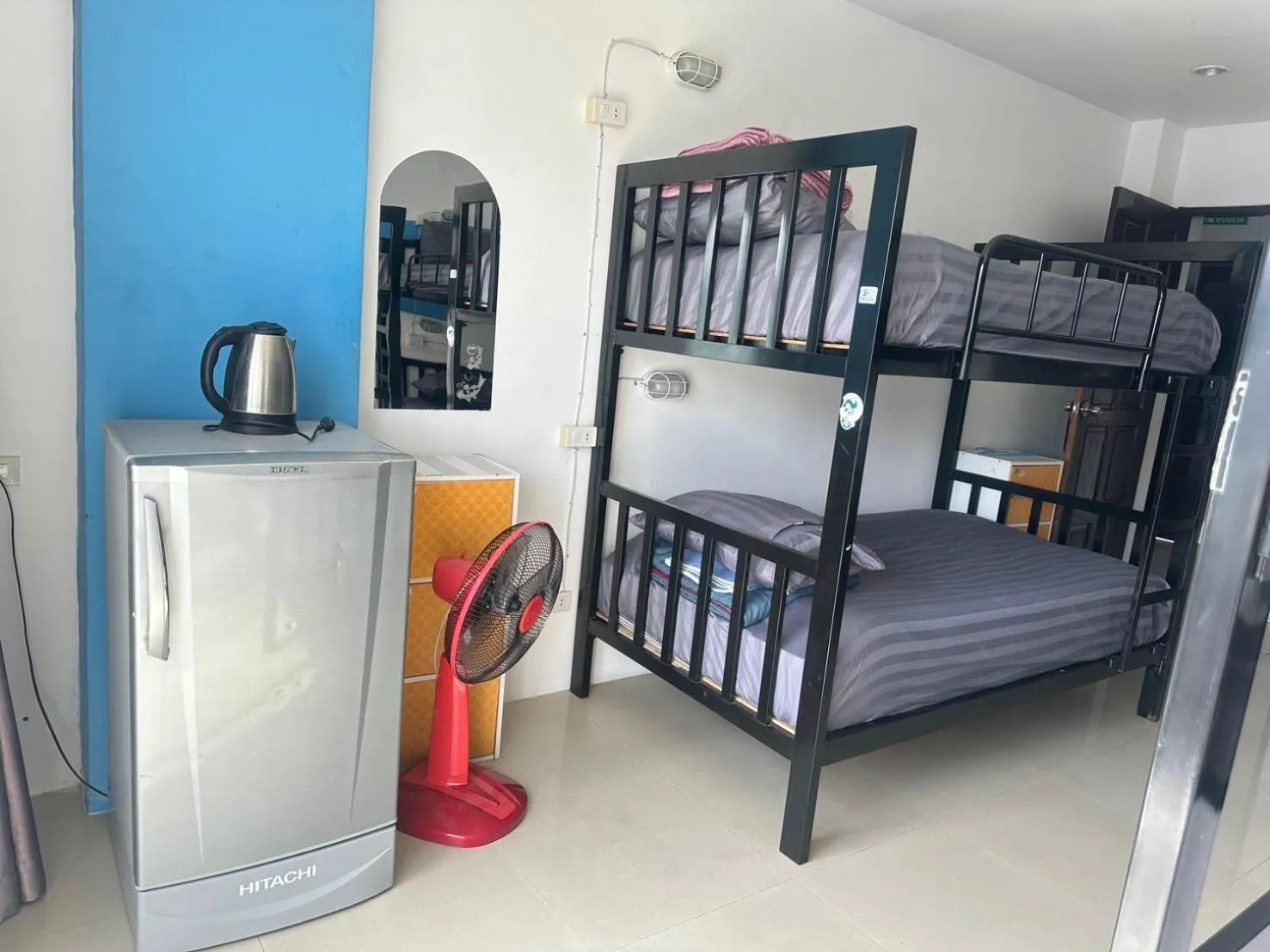 Bed in Happy Fish Guesthouse