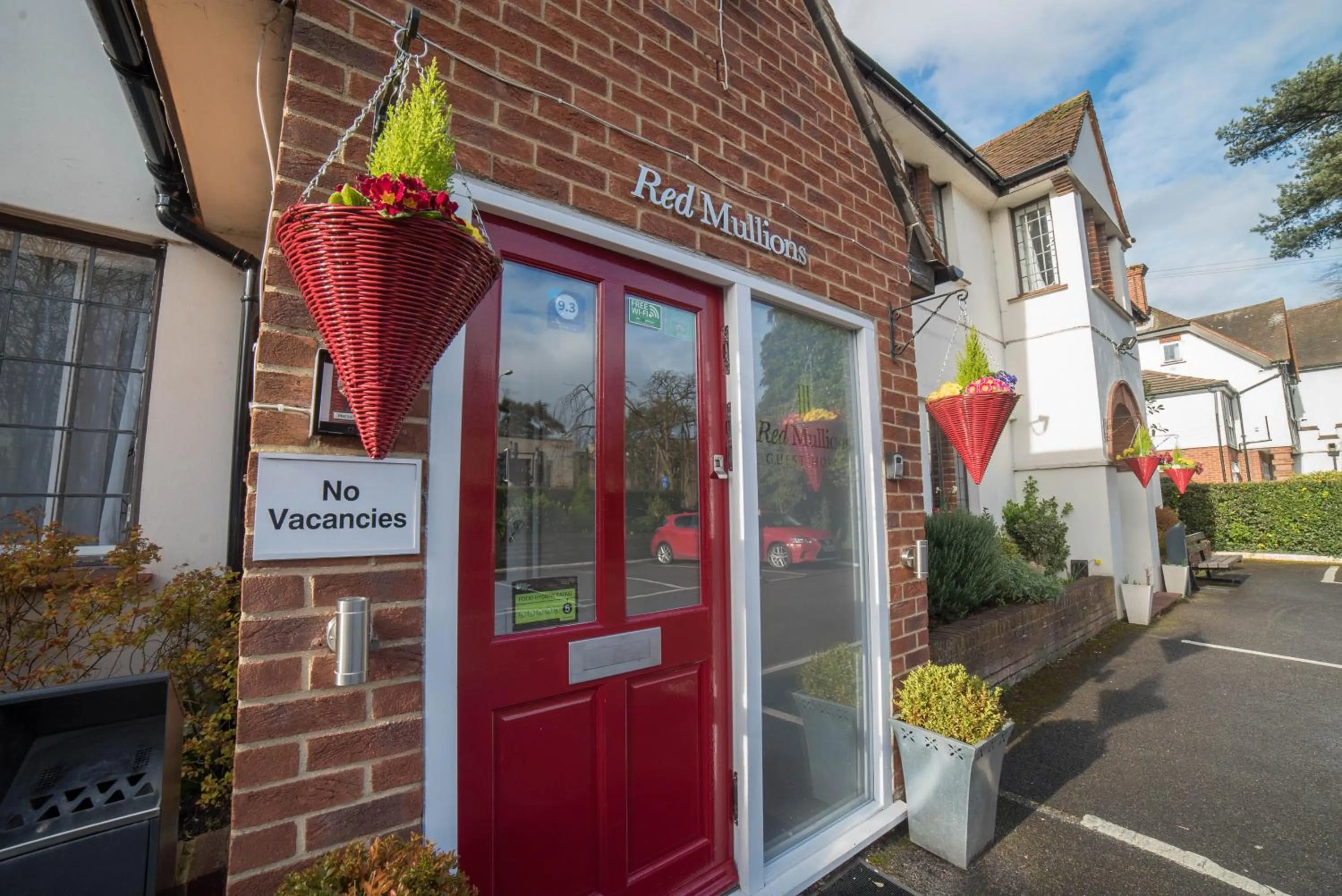 Property logo or sign in Red Mullions Guest House