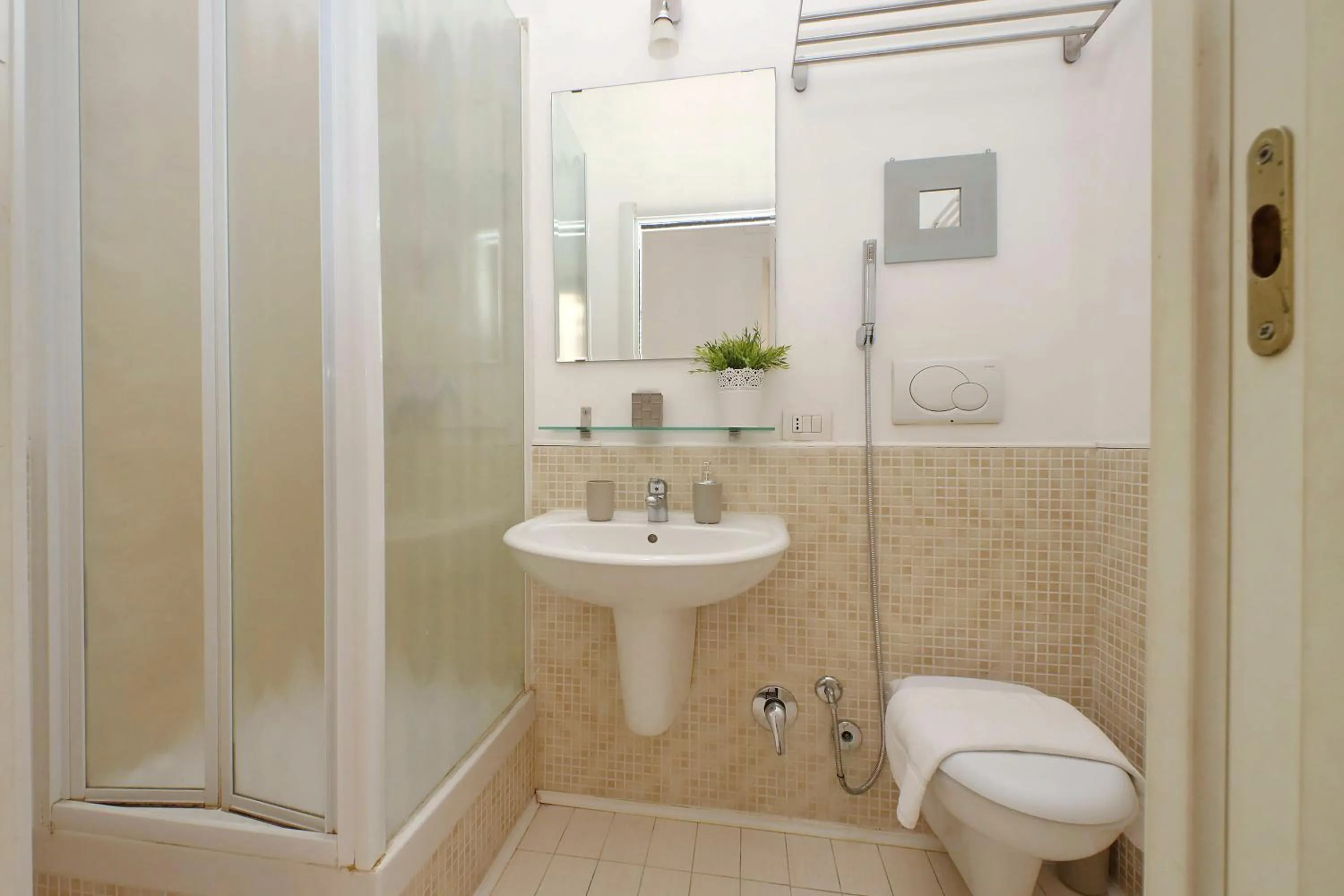 Bathroom in Opera Inn Suites - Rooms and Apartments