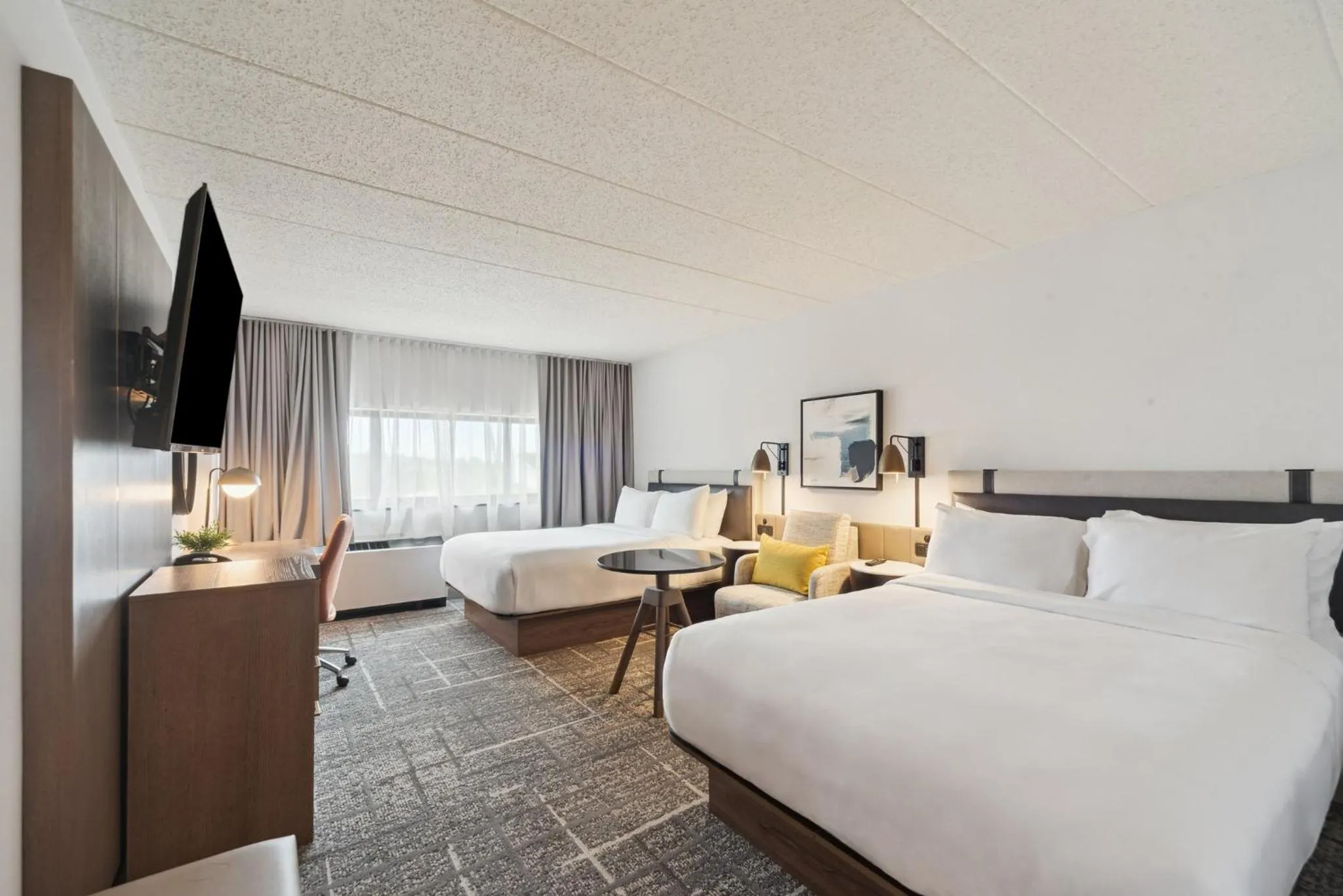 Photo of the whole room, Bed in Crowne Plaza Lansing by IHG