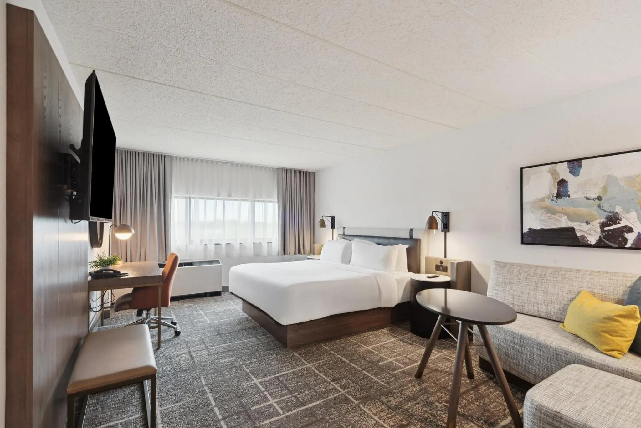 Photo of the whole room, Bed in Crowne Plaza Lansing by IHG