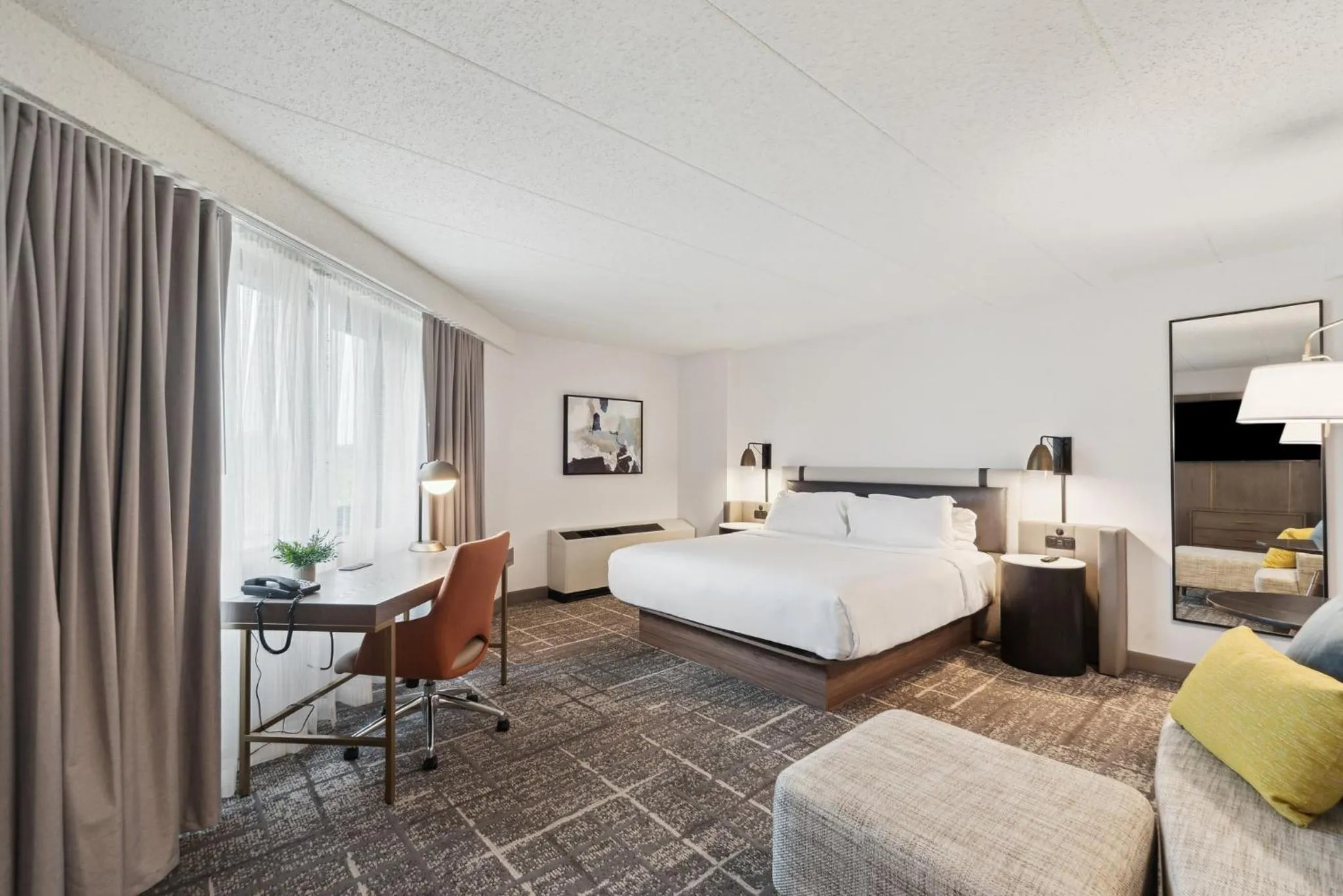 Photo of the whole room, Bed in Crowne Plaza Lansing by IHG