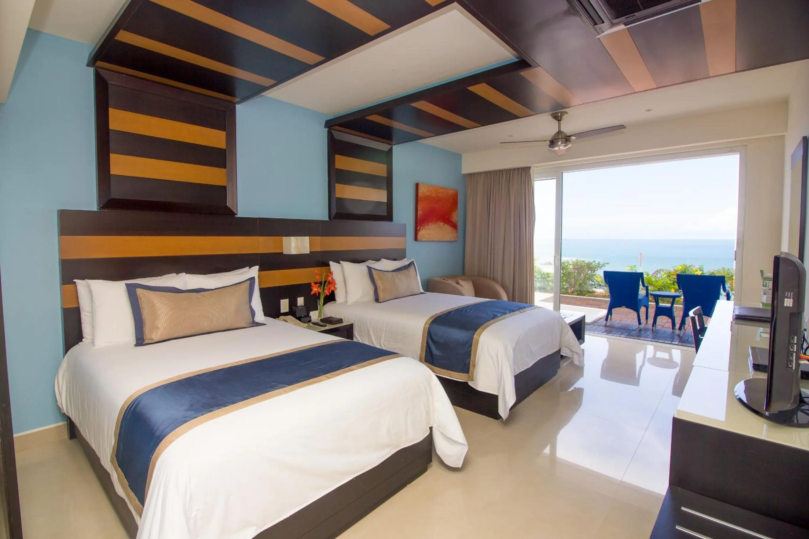 Photo of the whole room, Bed in Secrets Huatulco Resort & Spa