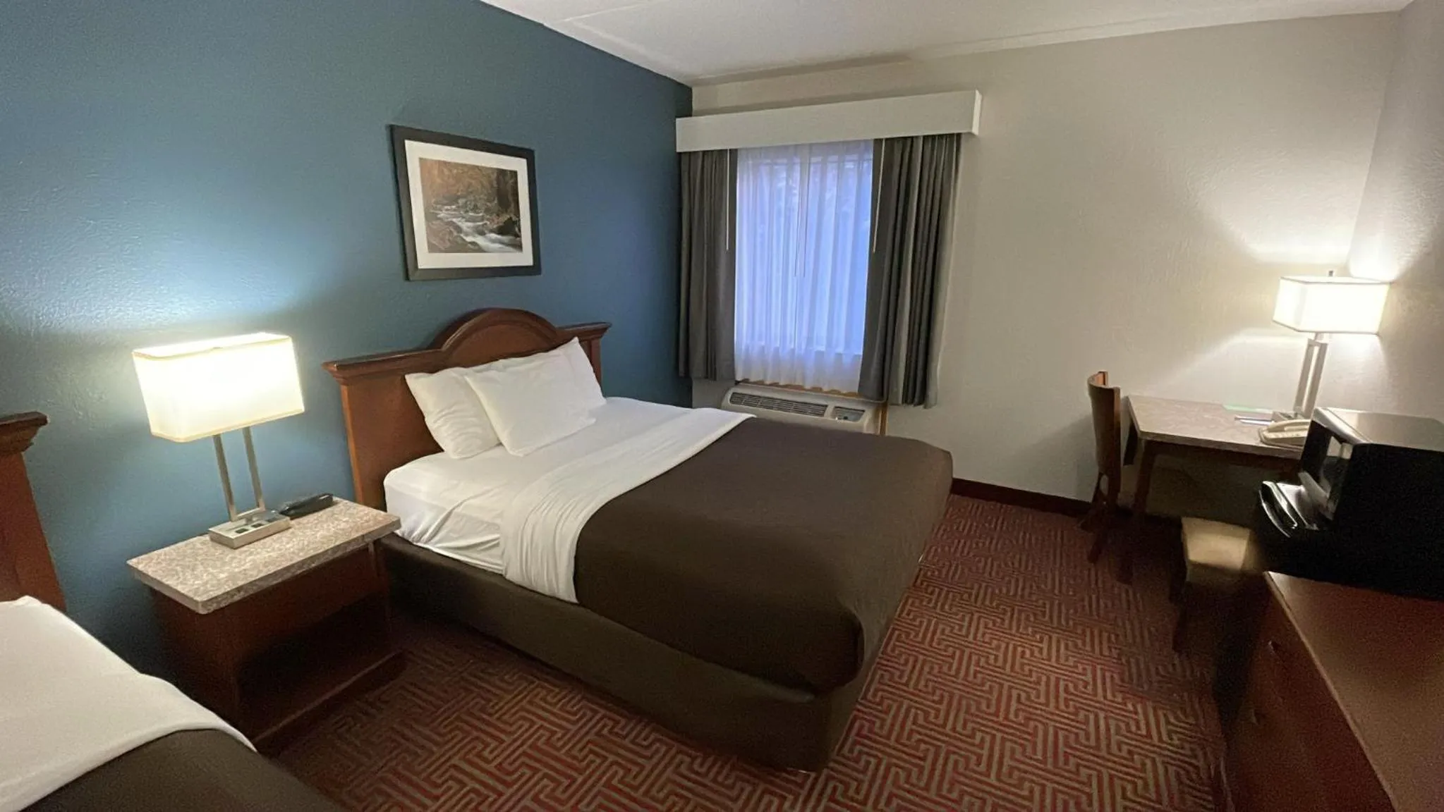 Bedroom, Bed in Clarion Inn I-94 near Expo Center