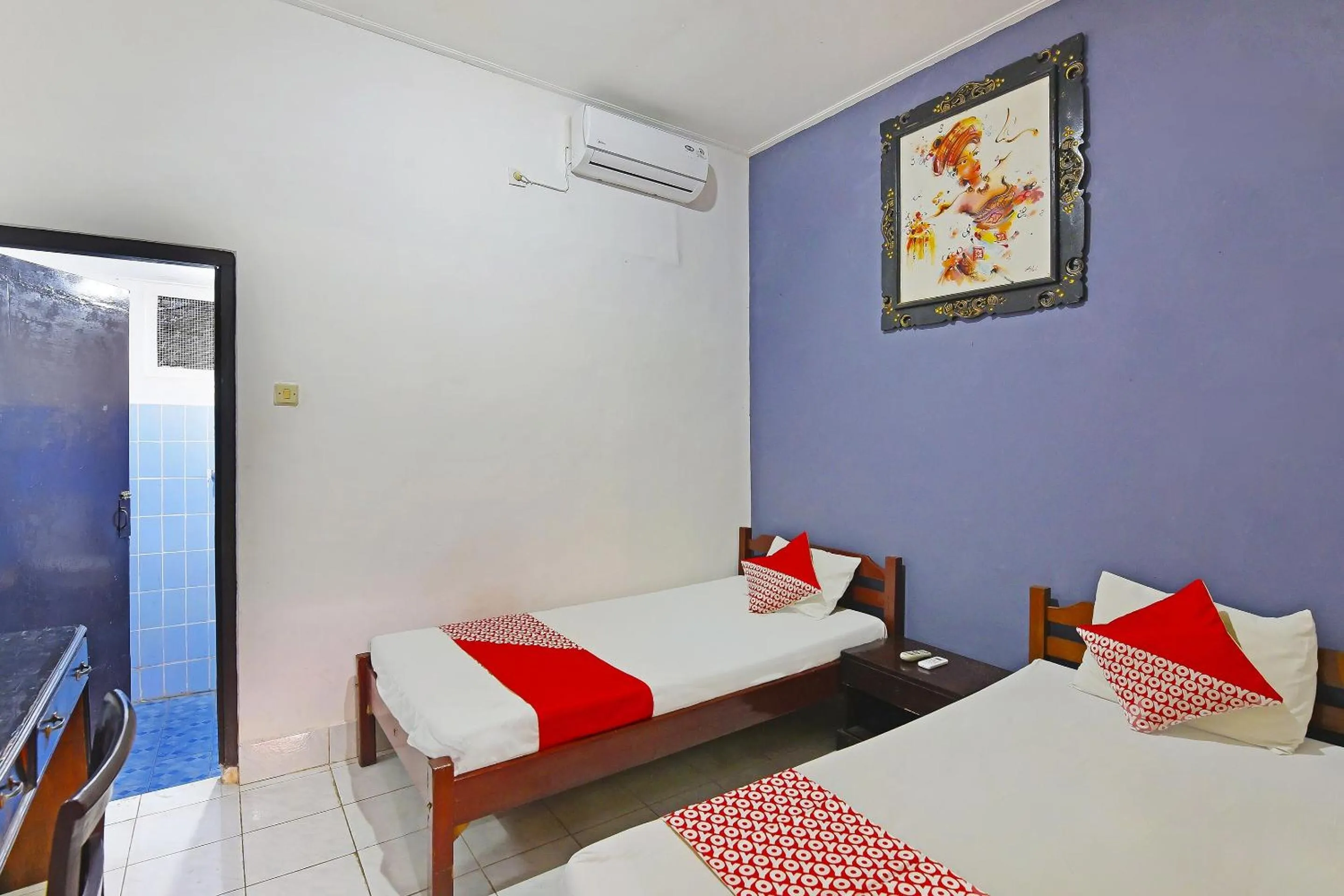 Bedroom in OYO 3244 Grand Chandra Hotel